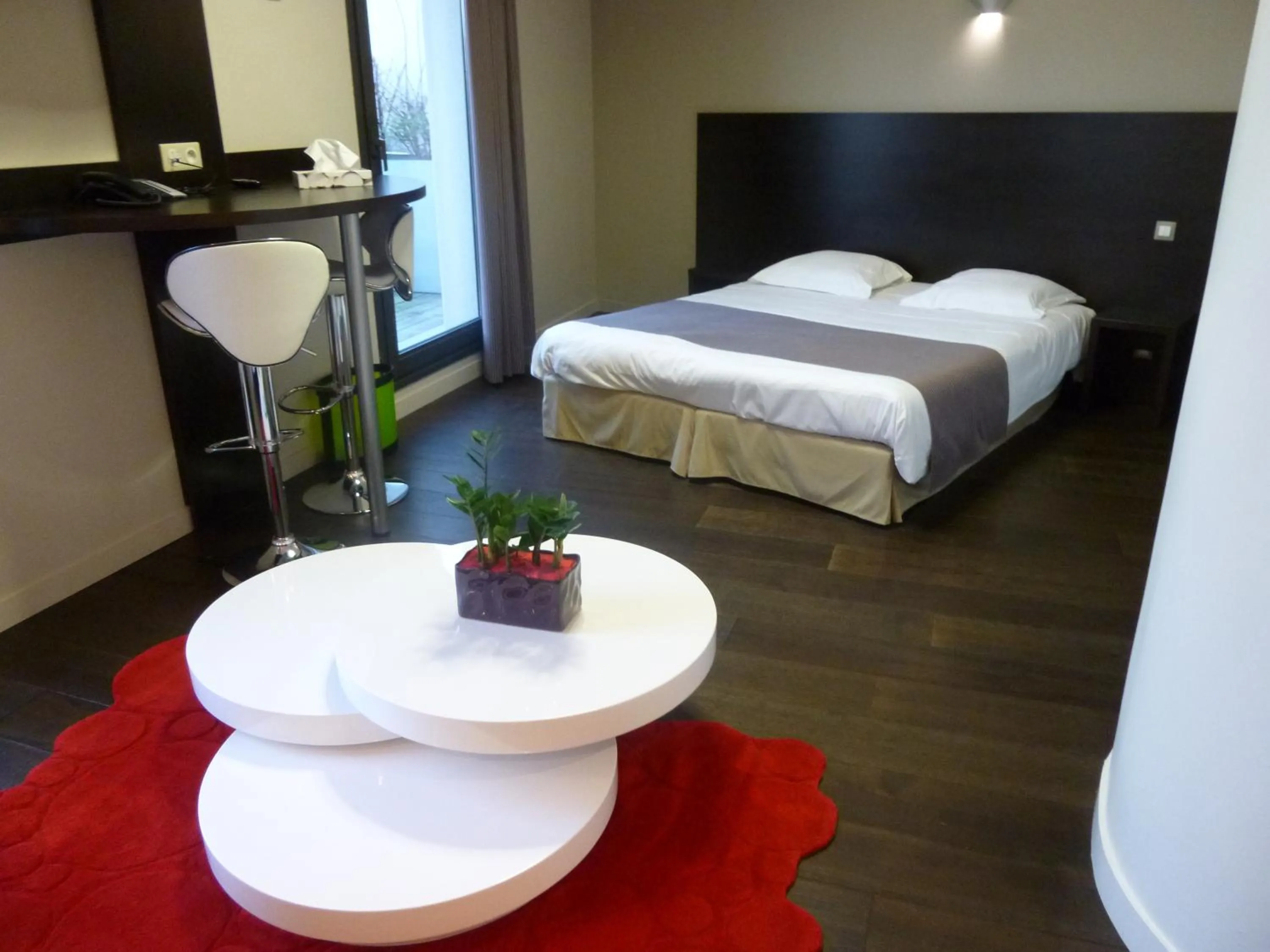 Photo of the whole room, Bed in Logis Hôtel Terre de Loire