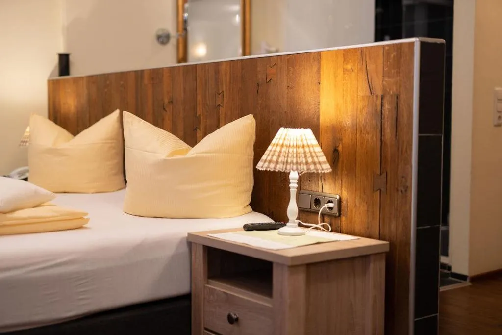 Bed in Haller's Posthotel