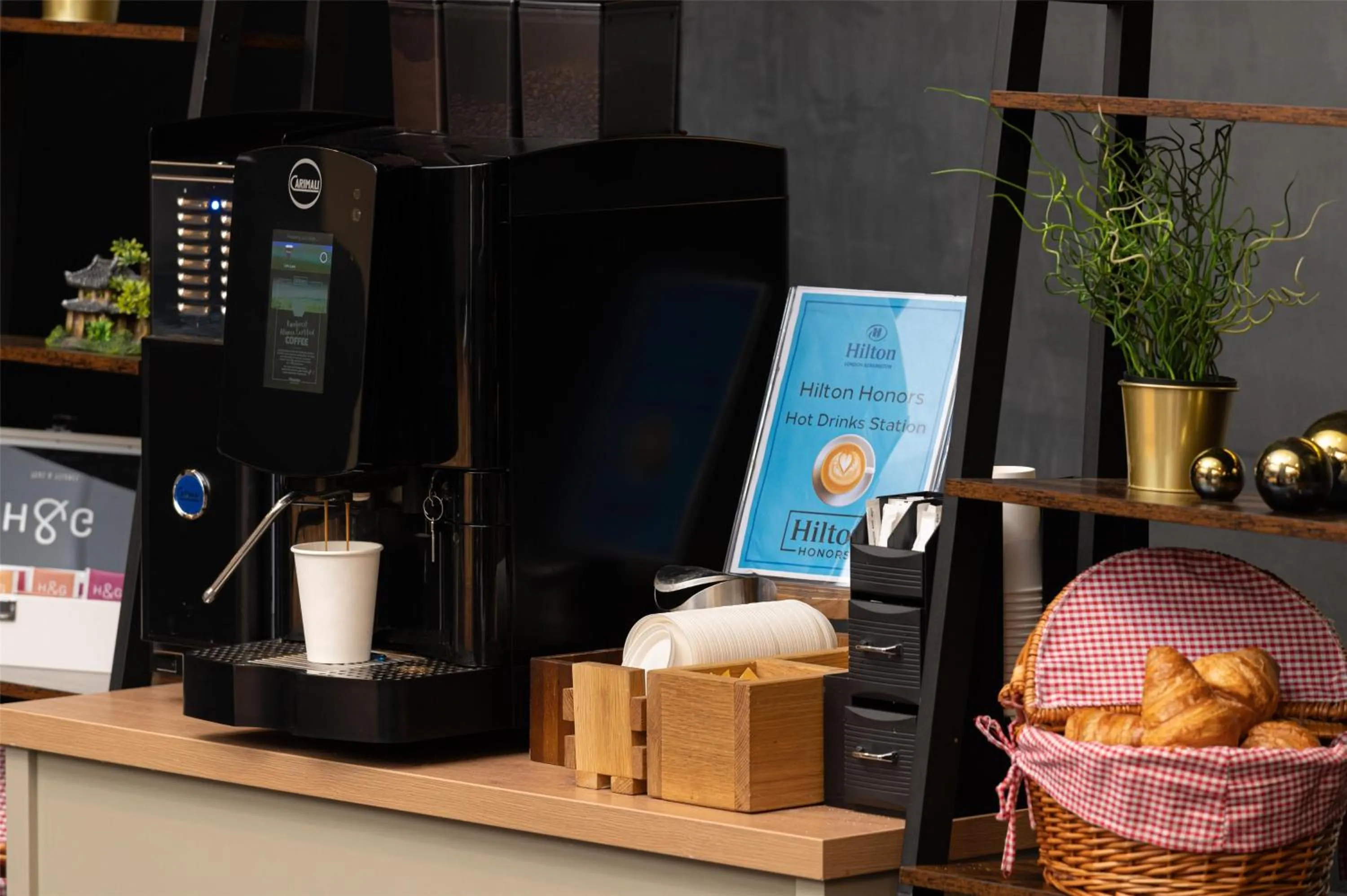 Dining area in Hilton London Kensington Hotel