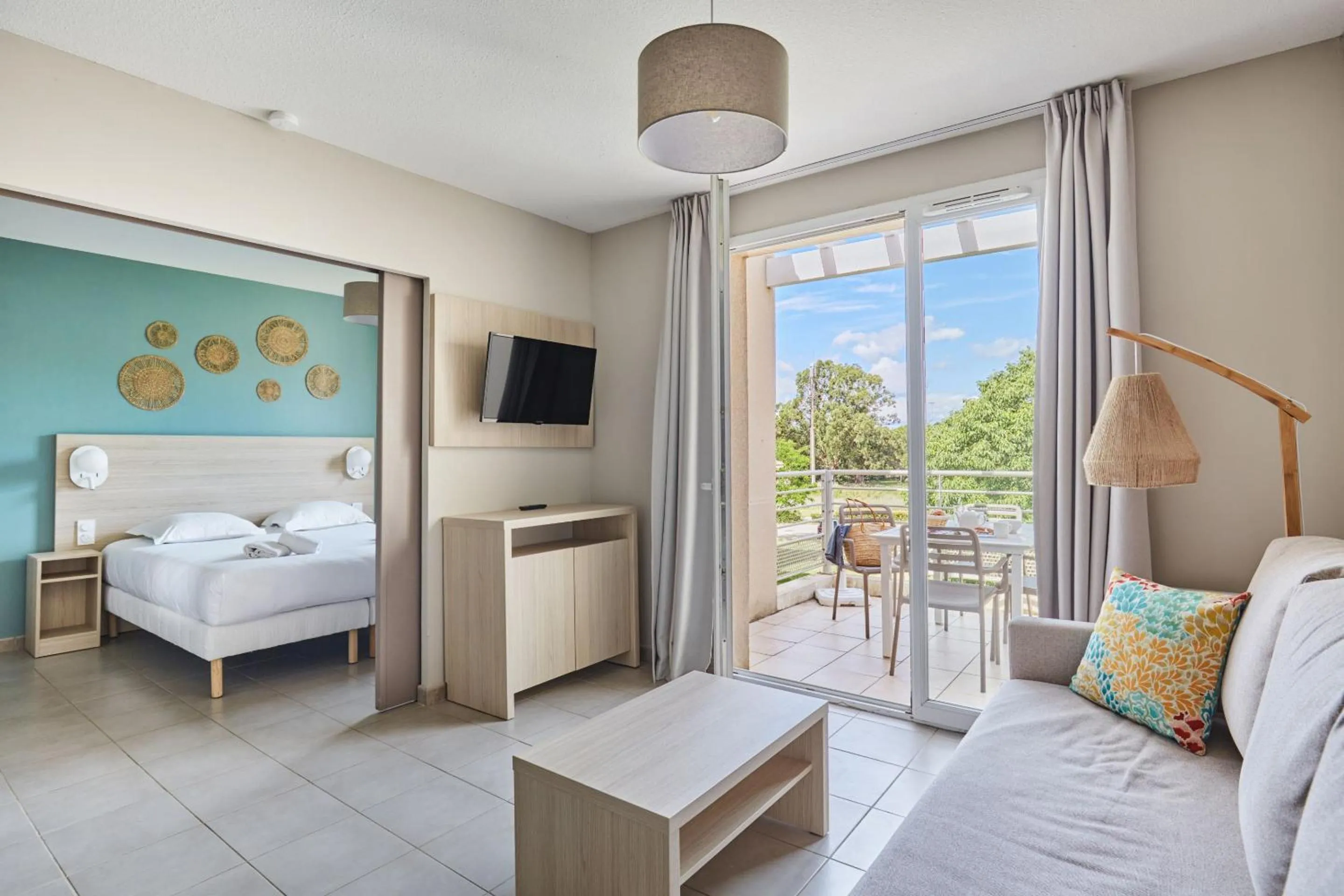 Seating area, Bed in Résidence Odalys Les Océanides