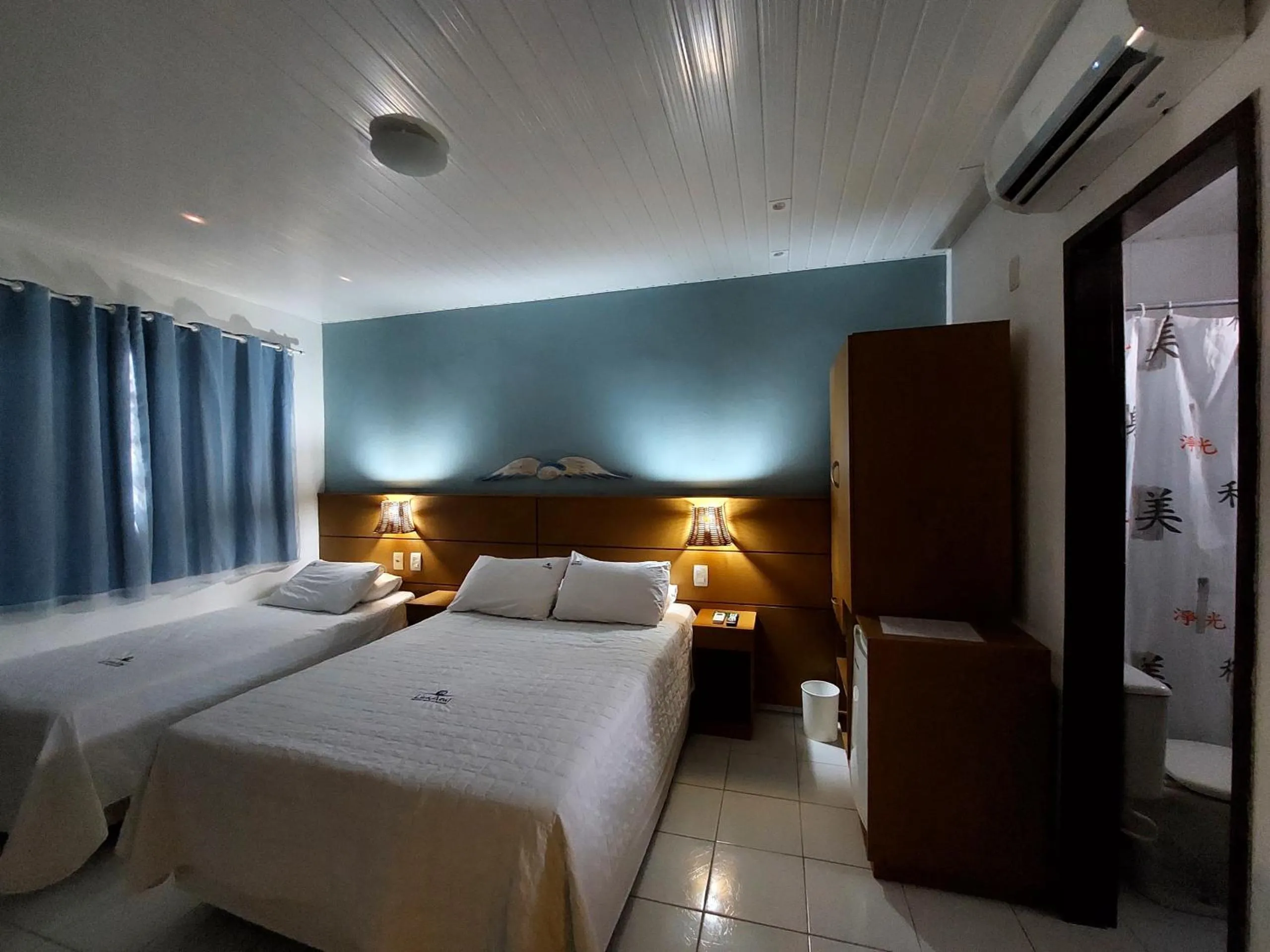 Bed in Pousada Lua Azul