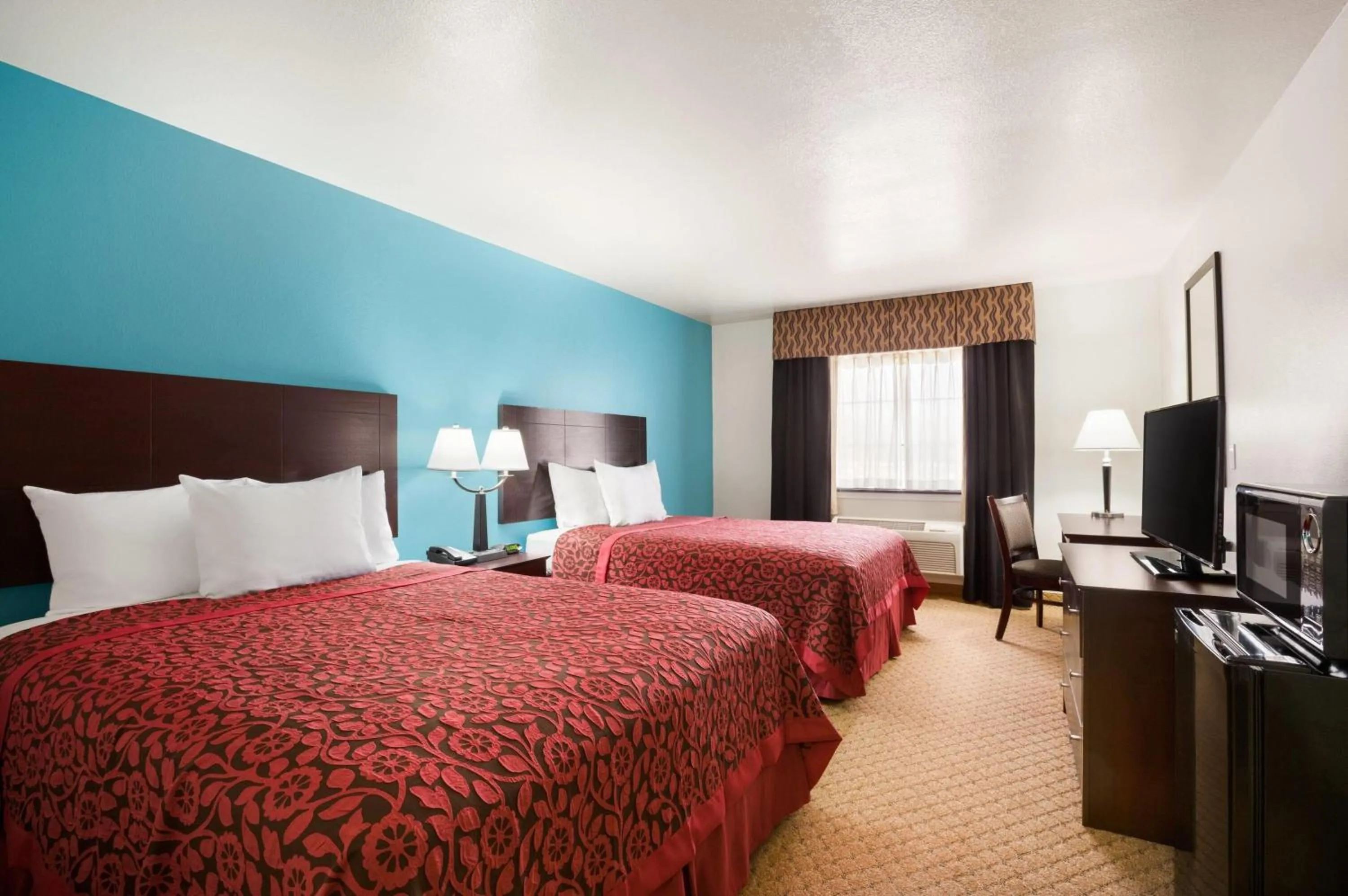 Photo of the whole room, Bed in Days Inn & Suites by Wyndham Conroe North