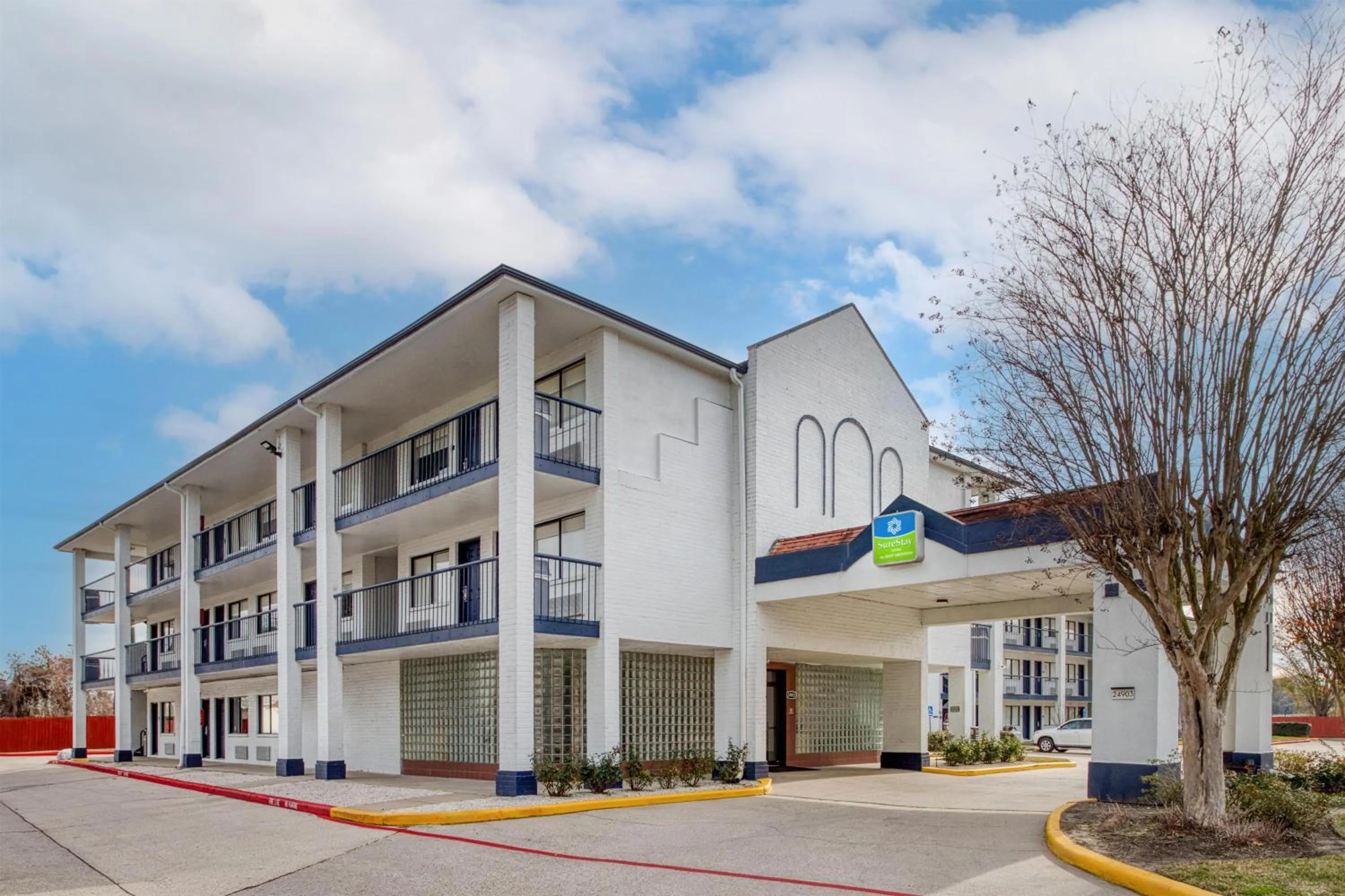 Property building in SureStay Hotel by Best Western Spring North Houston