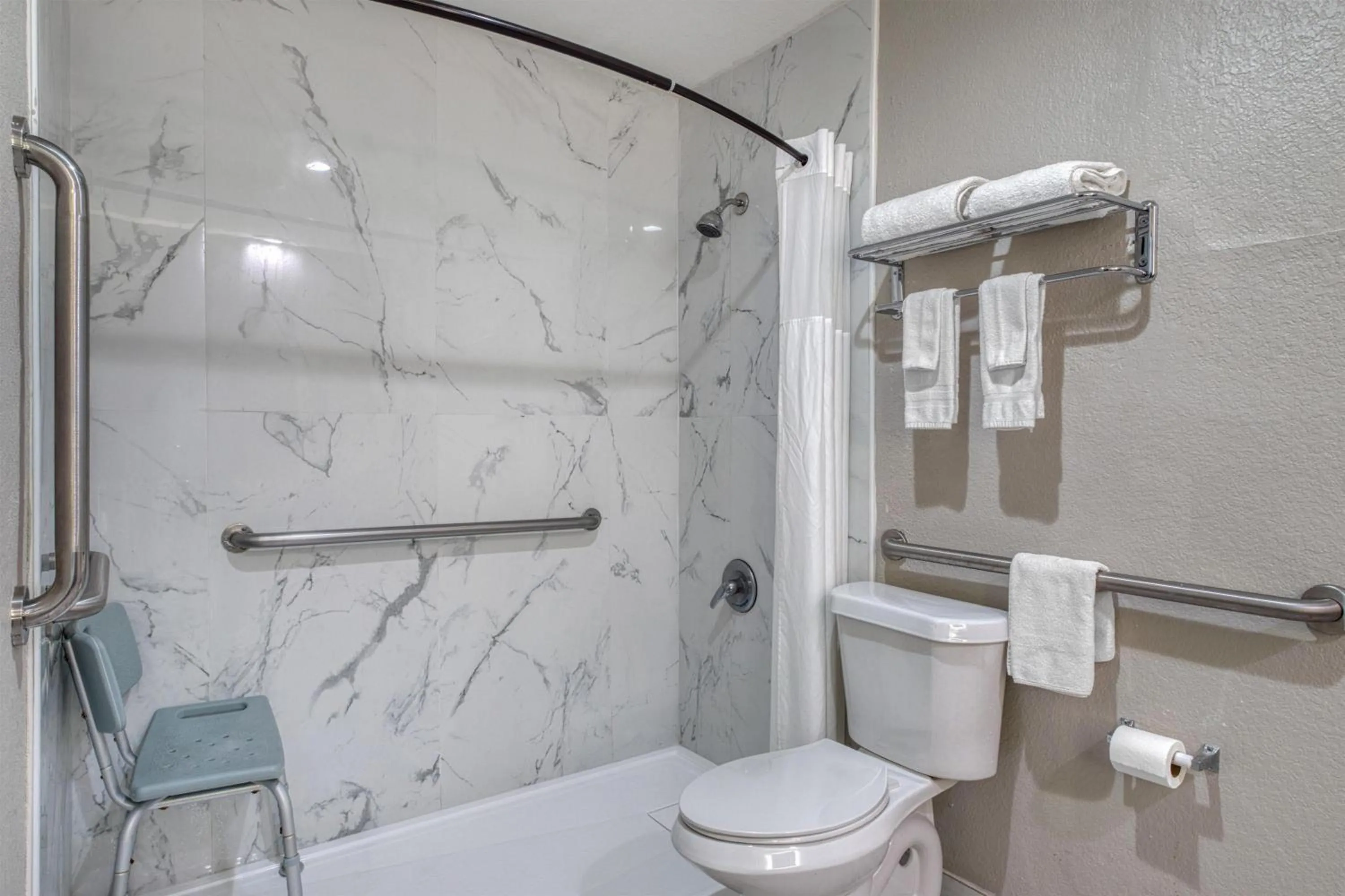 Bathroom in SureStay Hotel by Best Western Spring North Houston