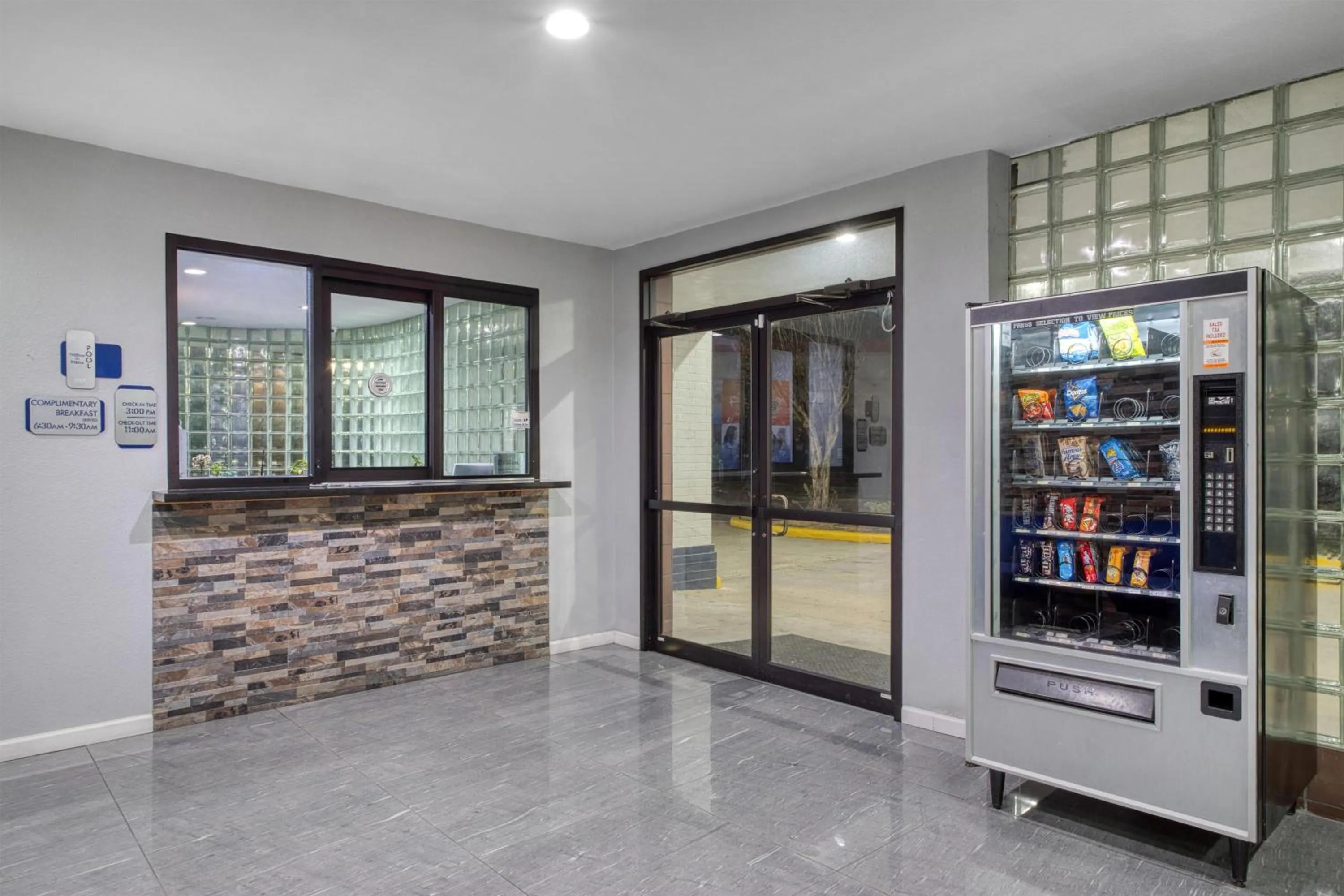 Lobby or reception in SureStay Hotel by Best Western Spring North Houston