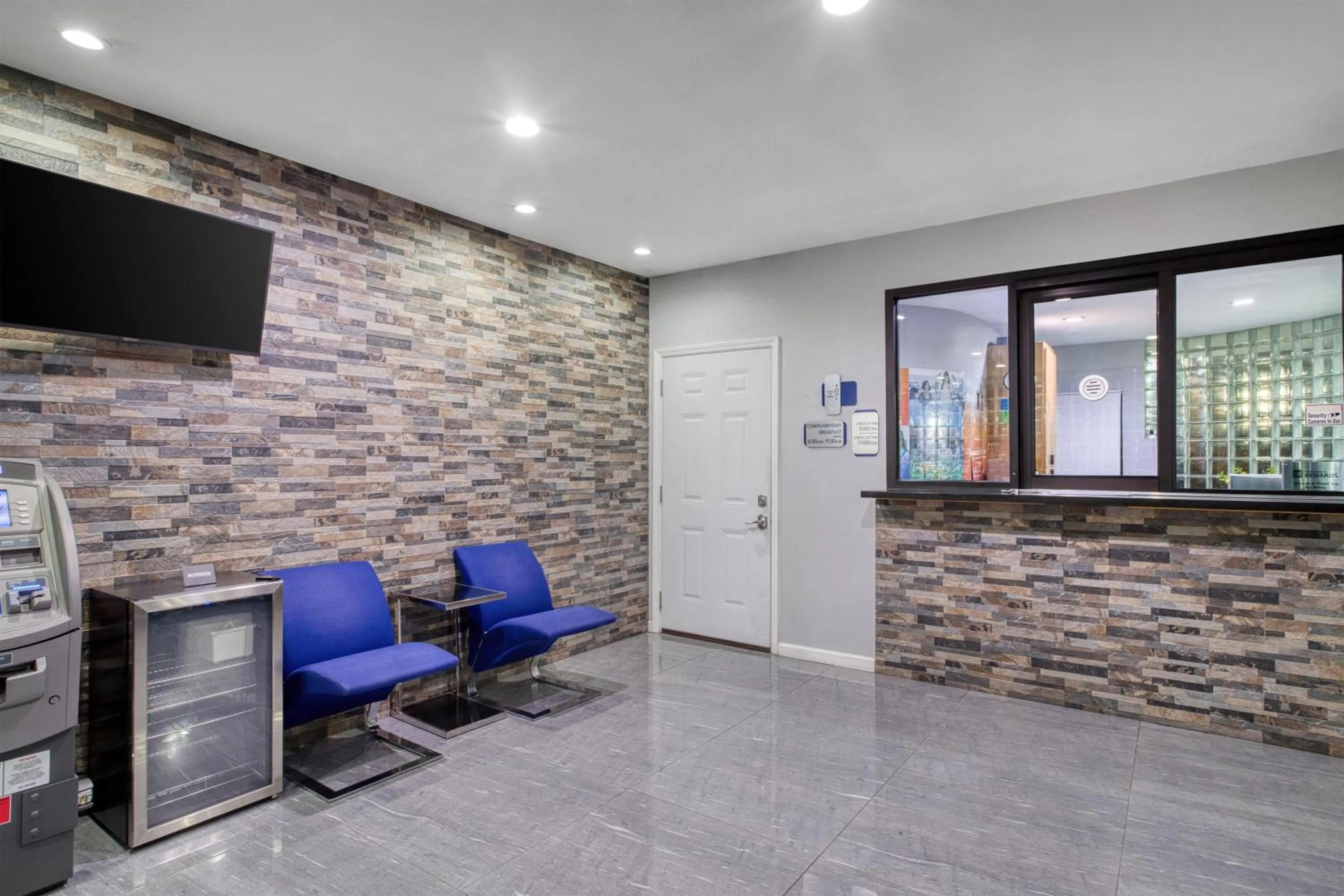 Lobby or reception in SureStay Hotel by Best Western Spring North Houston