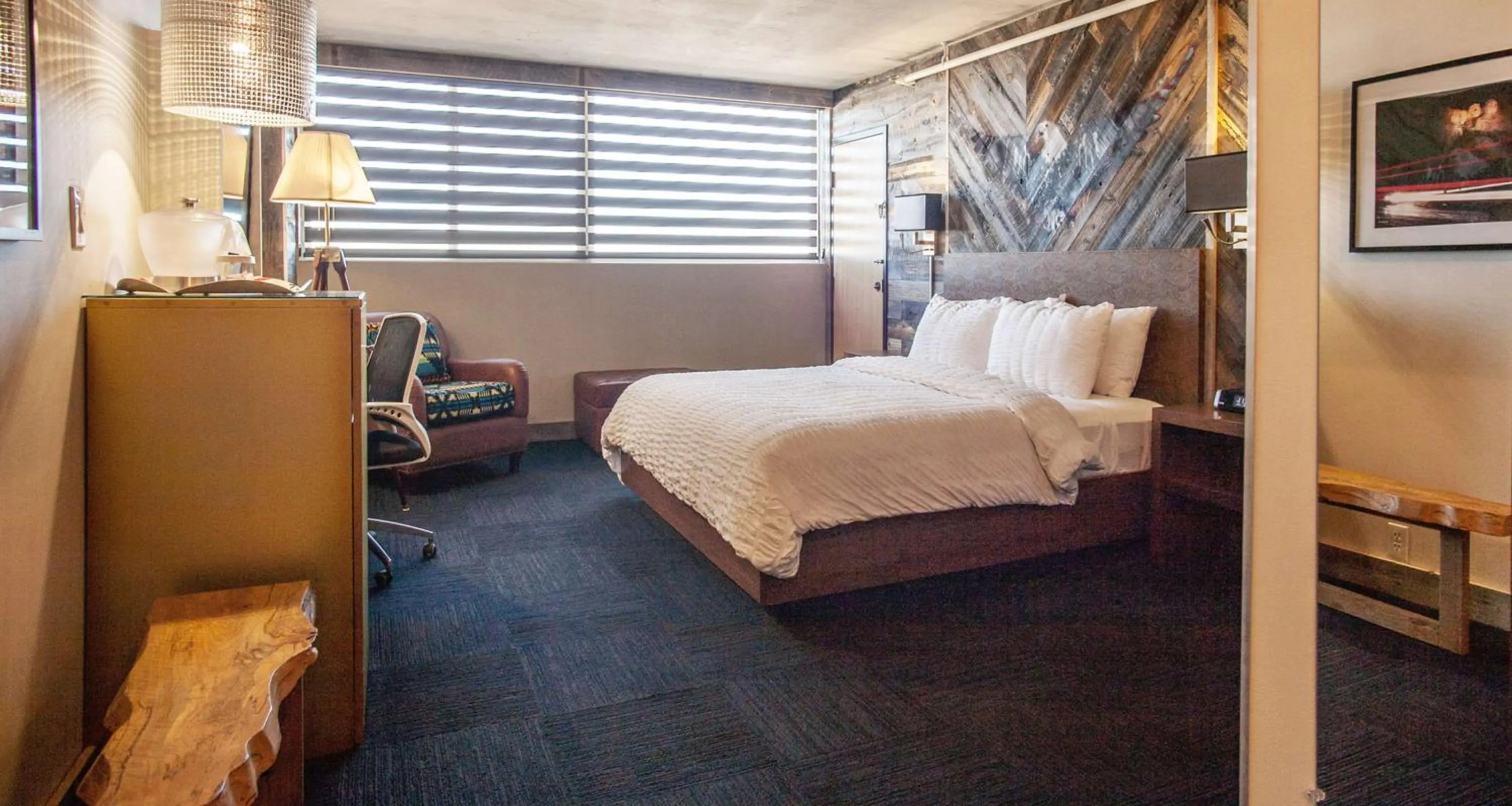 Photo of the whole room, Bed in The Rushmore Hotel & Suites; BW Premier Collection