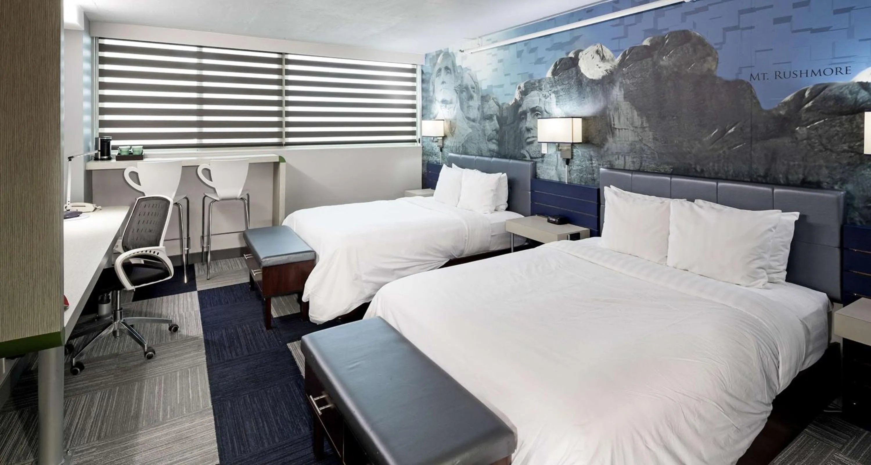 Photo of the whole room, Bed in The Rushmore Hotel & Suites; BW Premier Collection