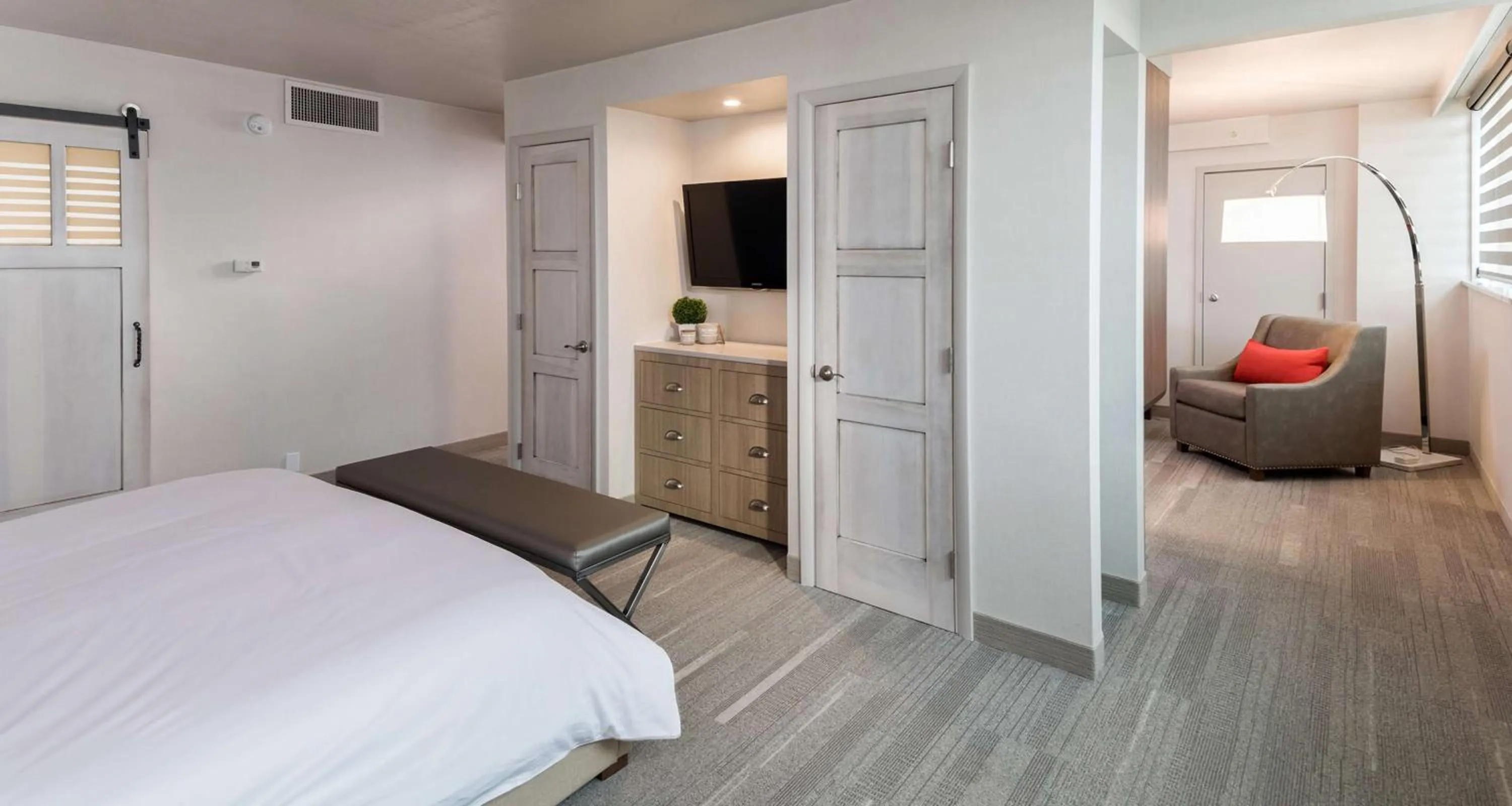 Photo of the whole room, Bed in The Rushmore Hotel & Suites; BW Premier Collection