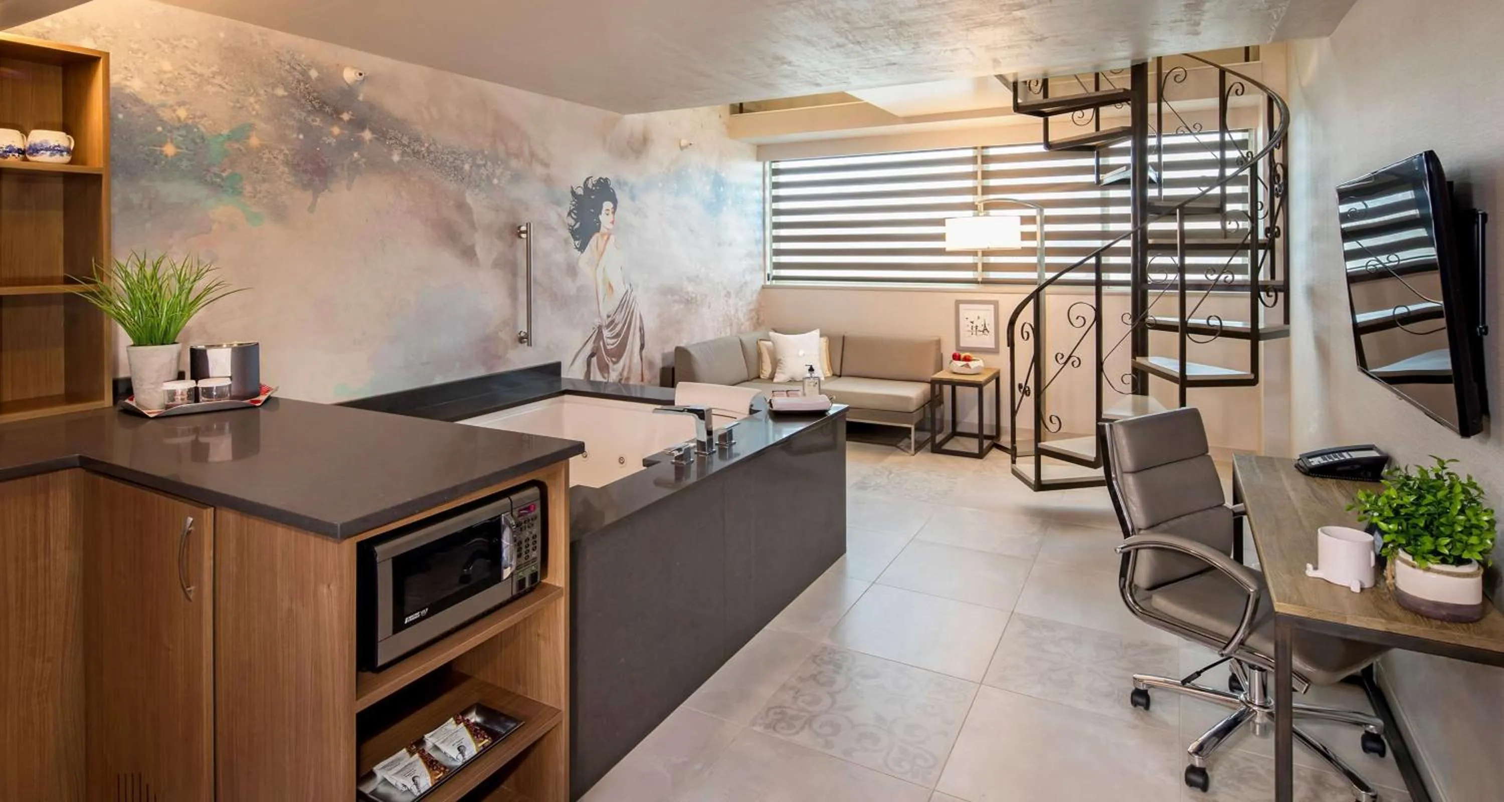 Photo of the whole room, Bed in The Rushmore Hotel & Suites; BW Premier Collection