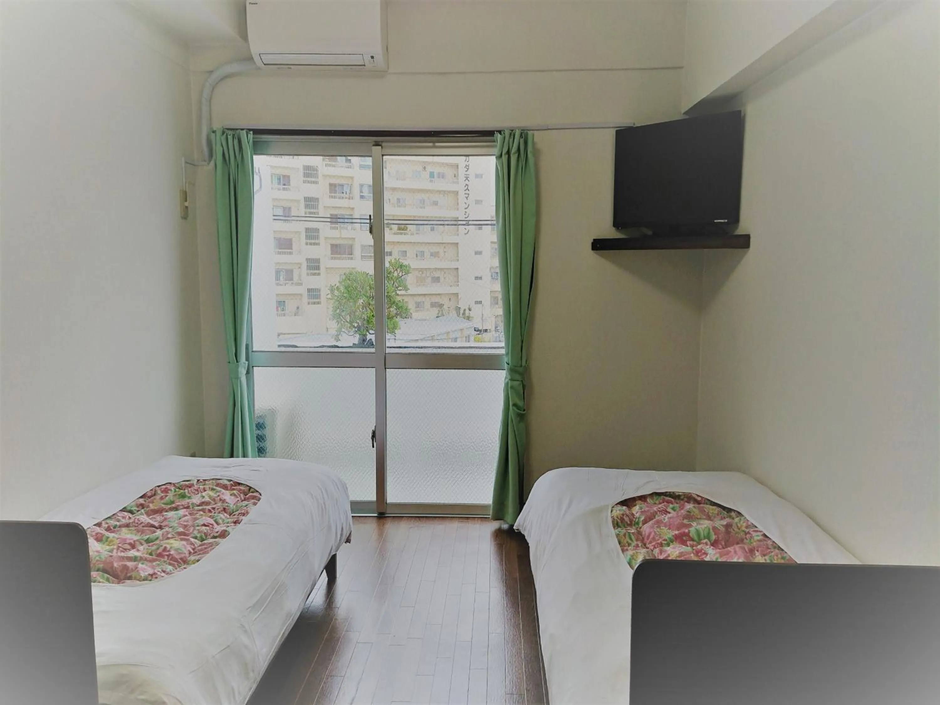 Bedroom in Sunset Hills Inn Naha