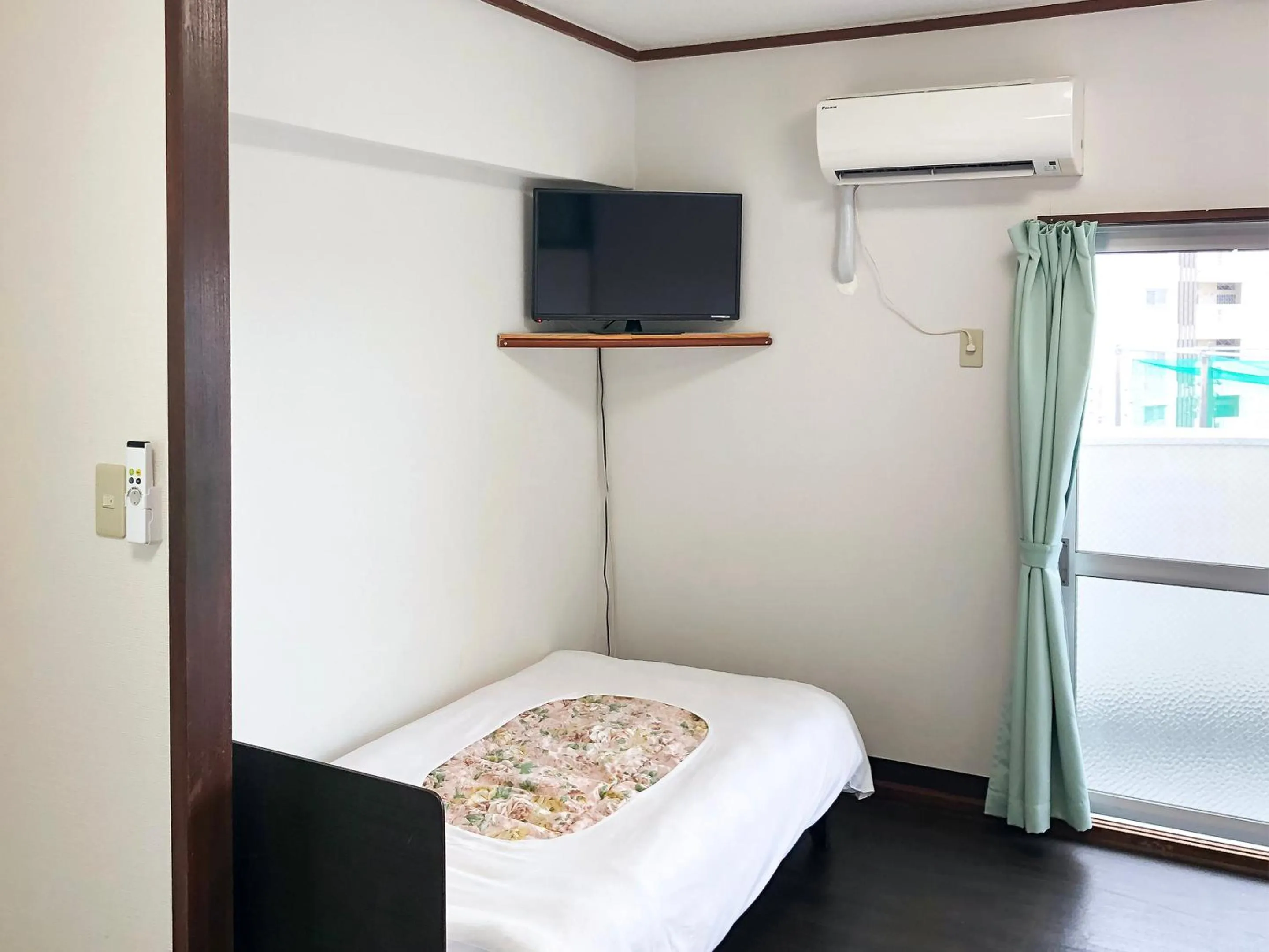 Photo of the whole room in Sunset Hills Inn Naha