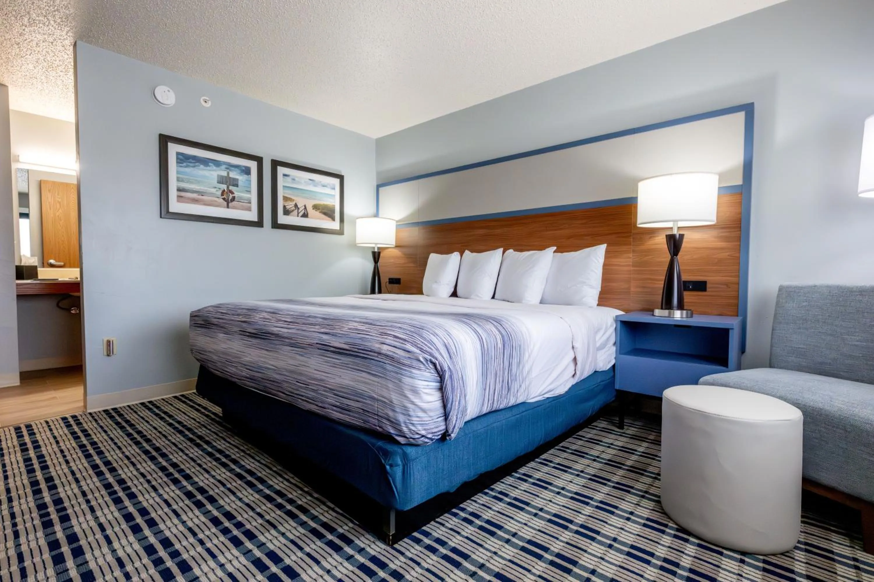 Bed in AmericInn by Wyndham Sturgeon Bay