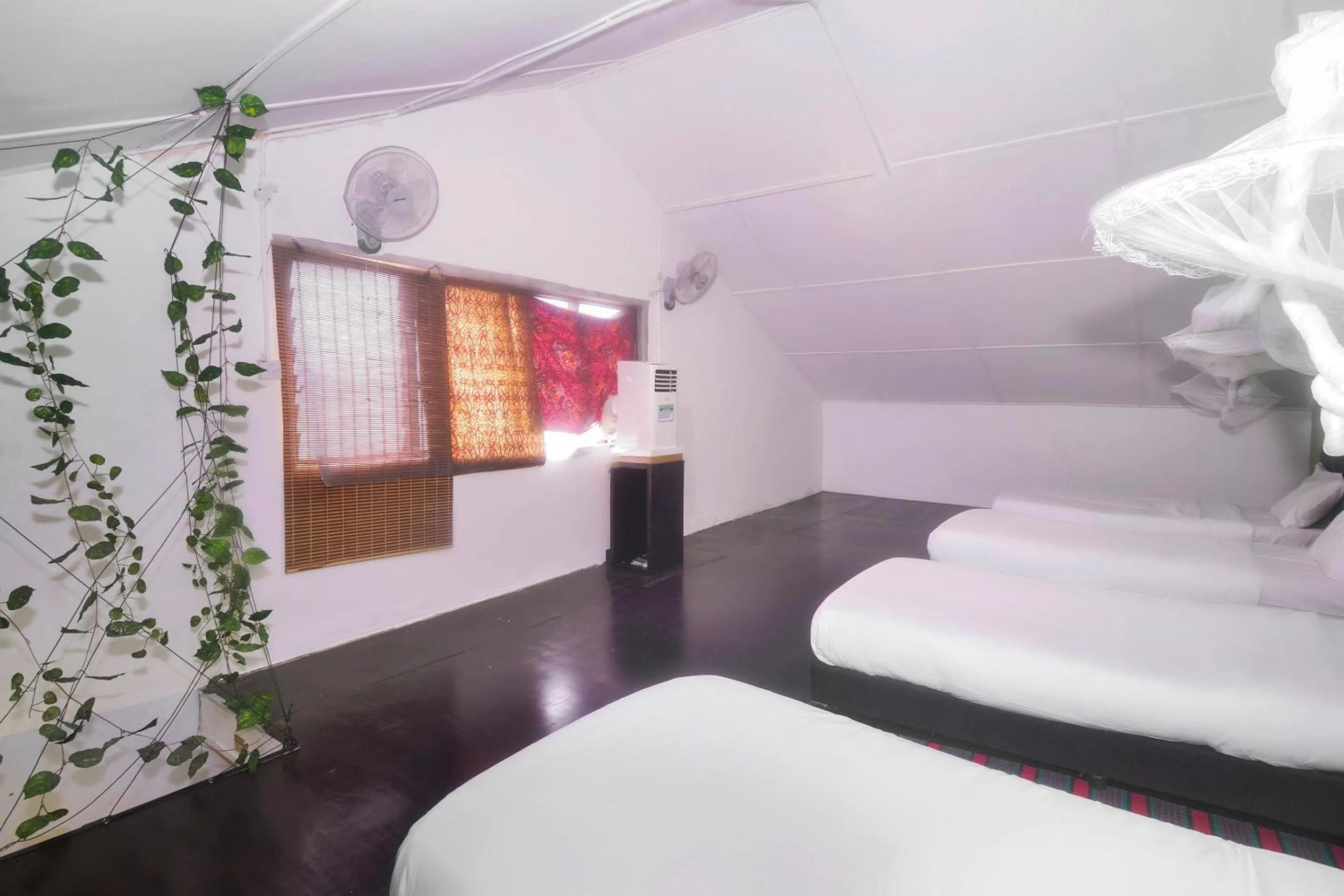 Bedroom in Hotel O Tropical Lodge