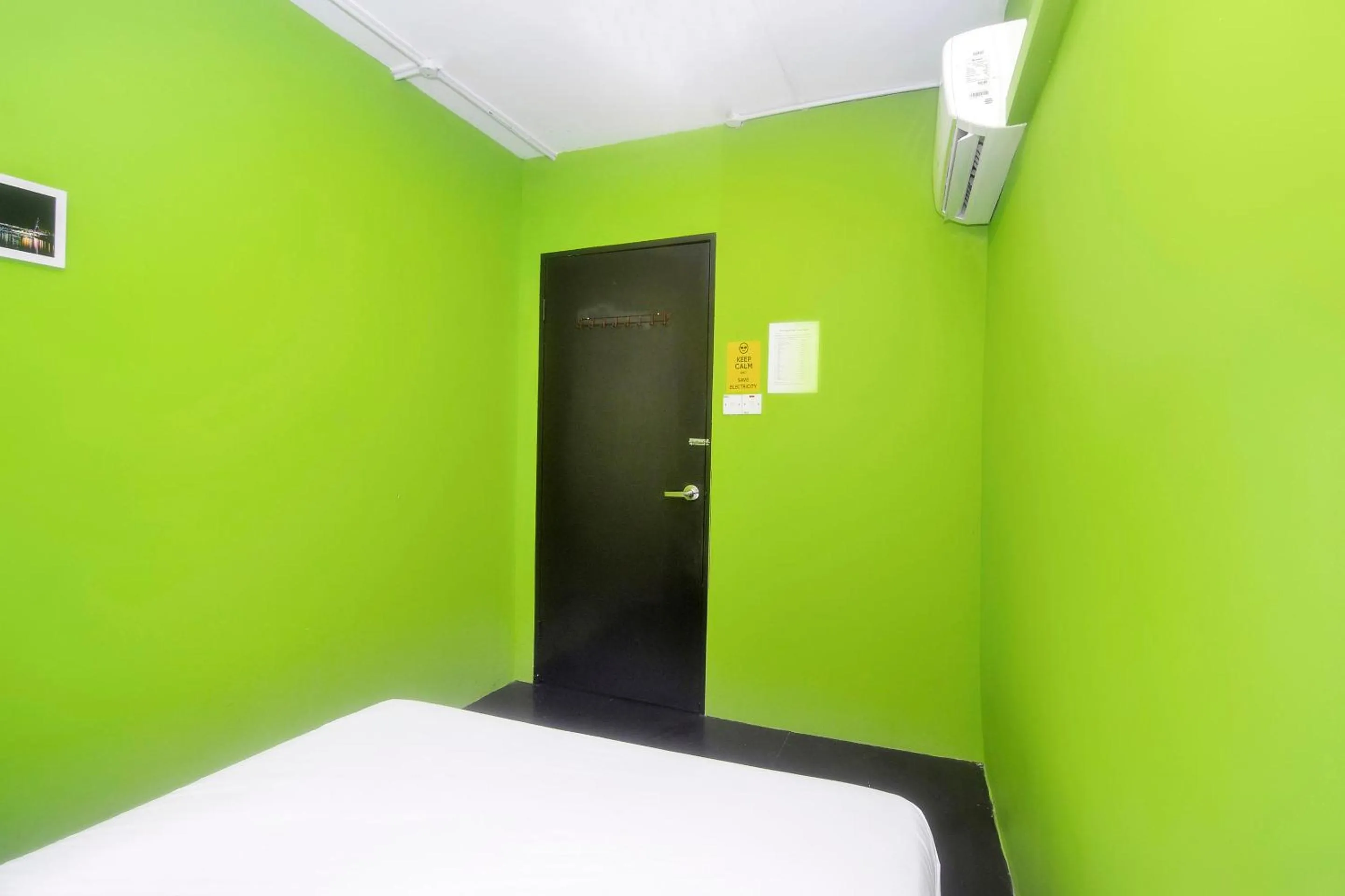 Bedroom in Hotel O Tropical Lodge