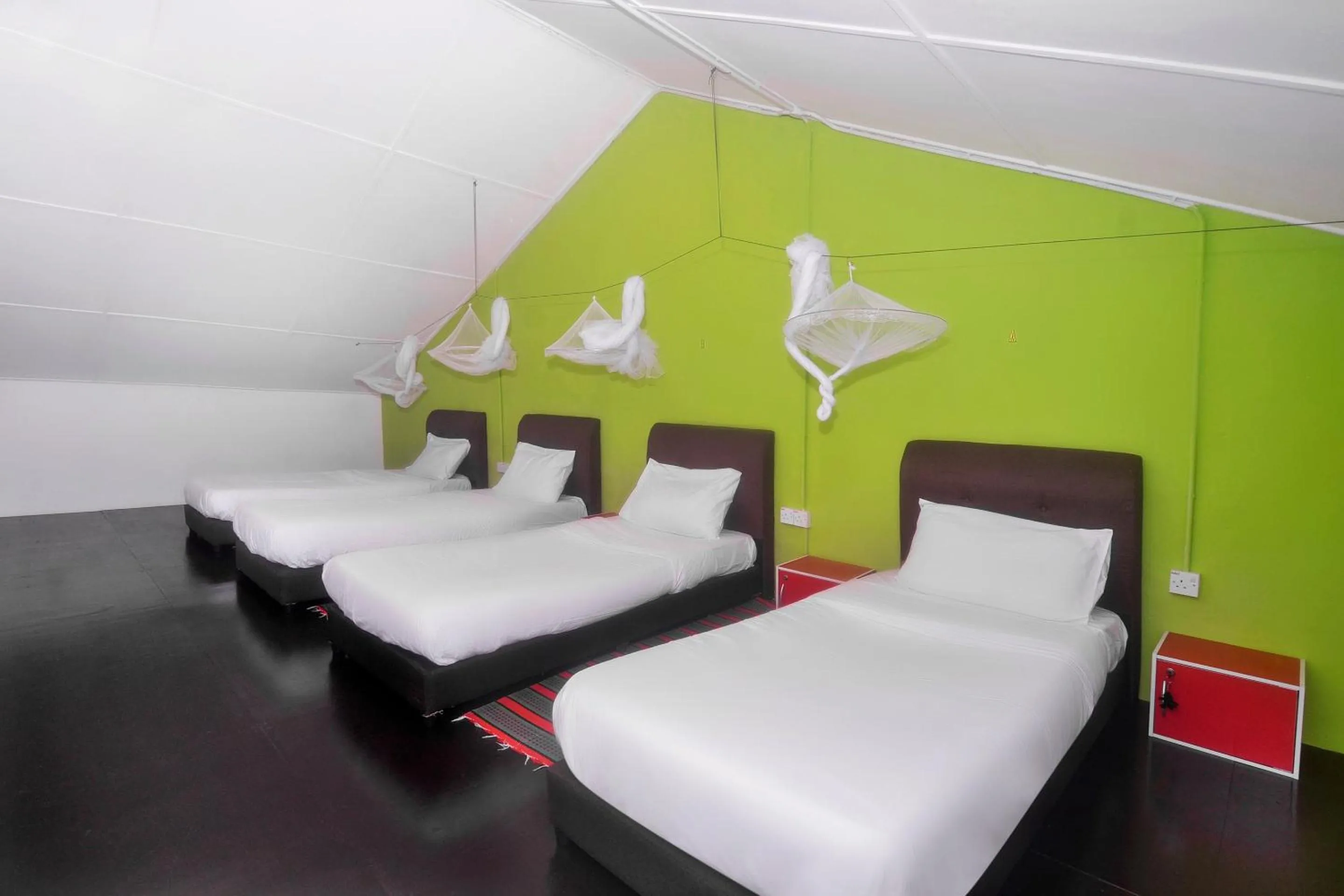 Bedroom in Hotel O Tropical Lodge