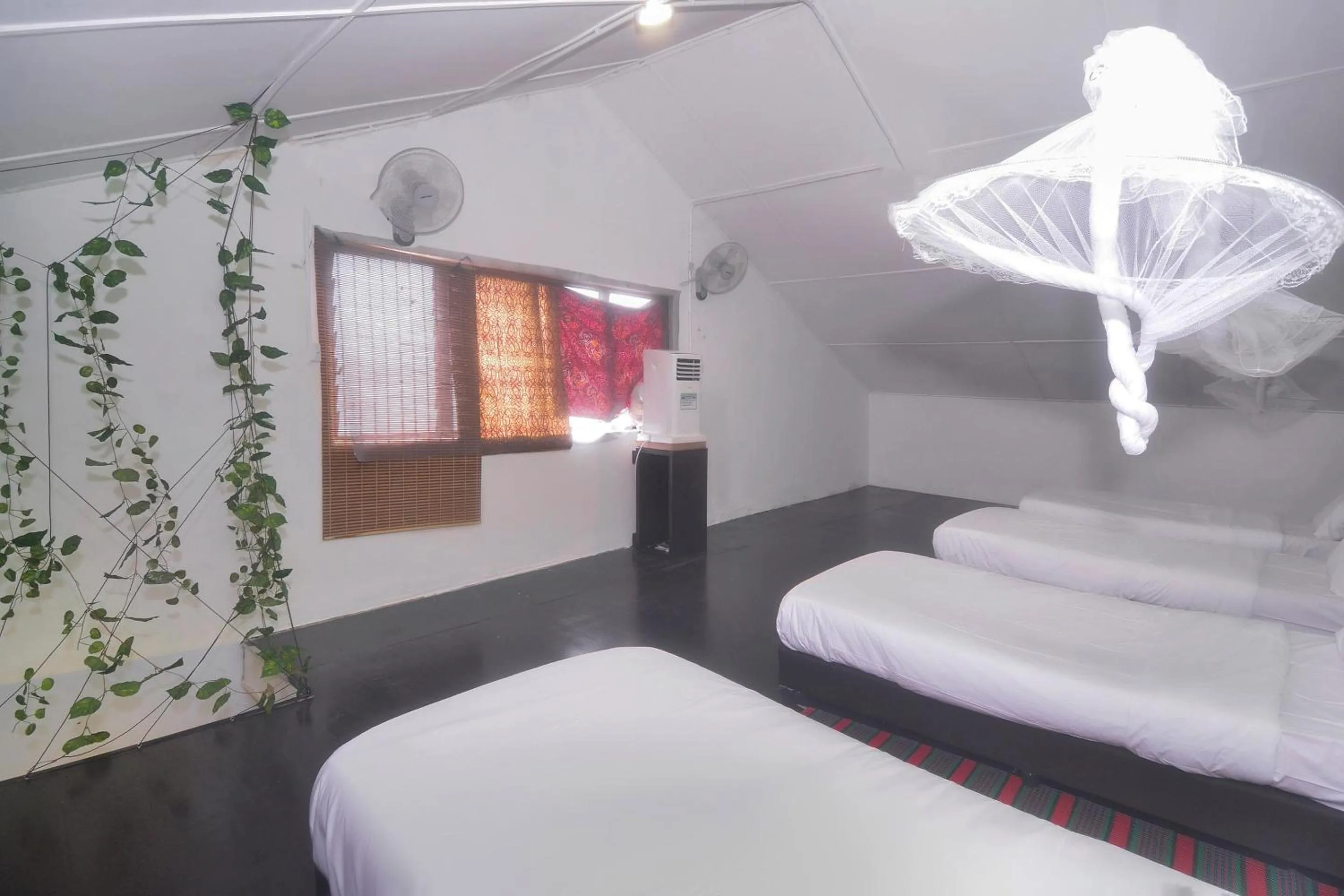 Bedroom in Hotel O Tropical Lodge