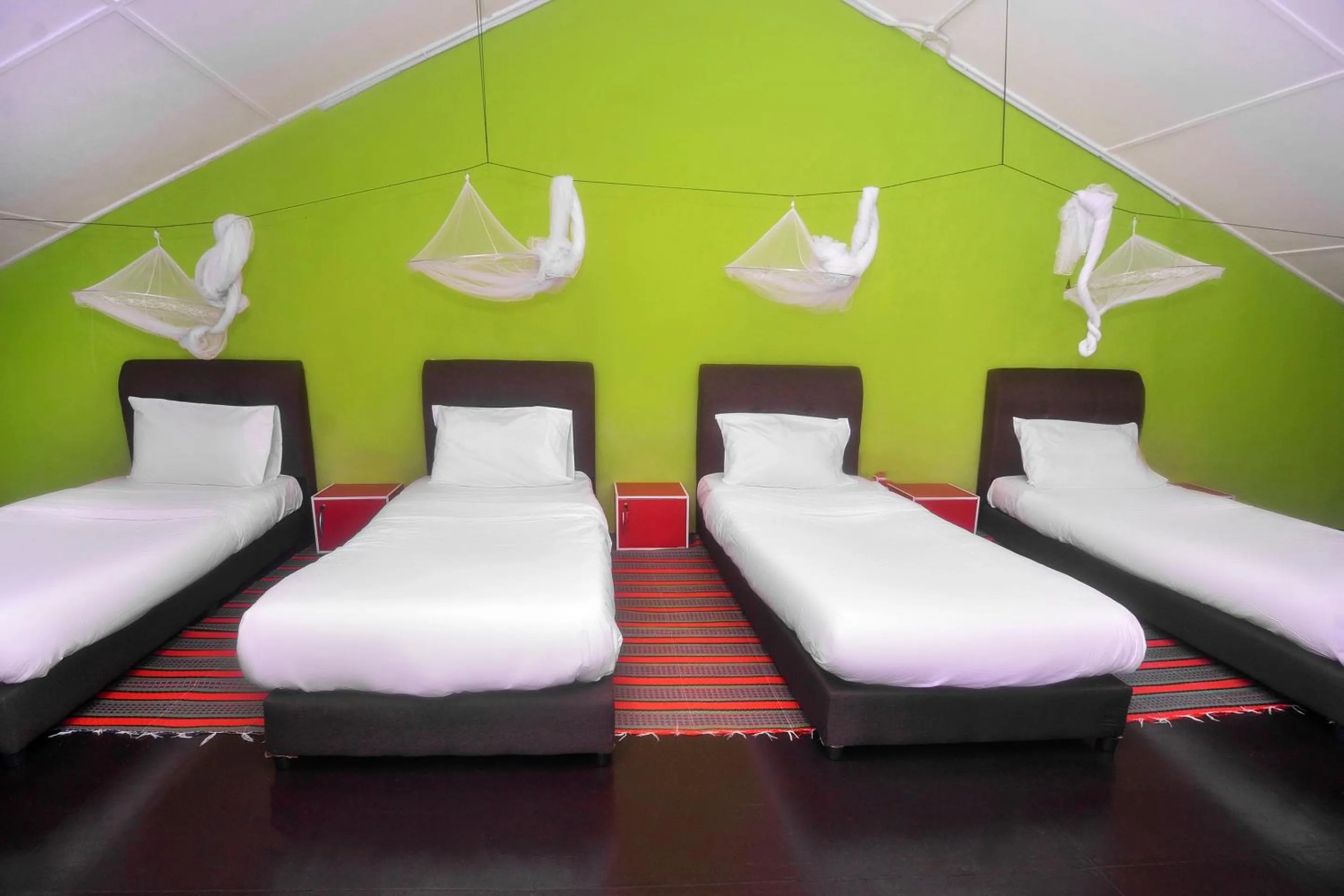 Bedroom in Hotel O Tropical Lodge