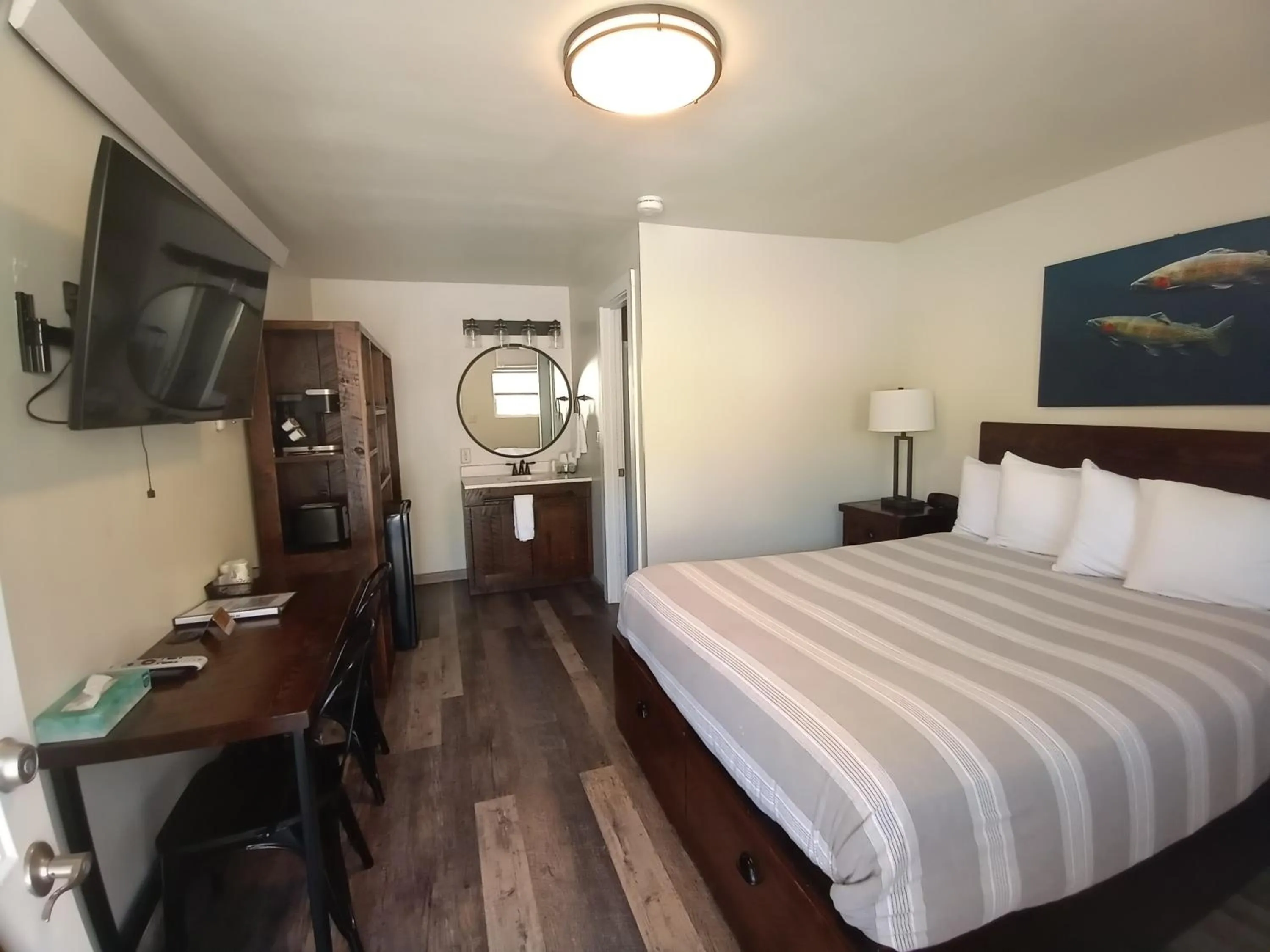 Bed in Yellowstone Riverside Cottages