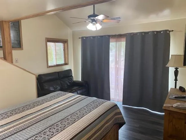 Bed in Yellowstone Riverside Cottages