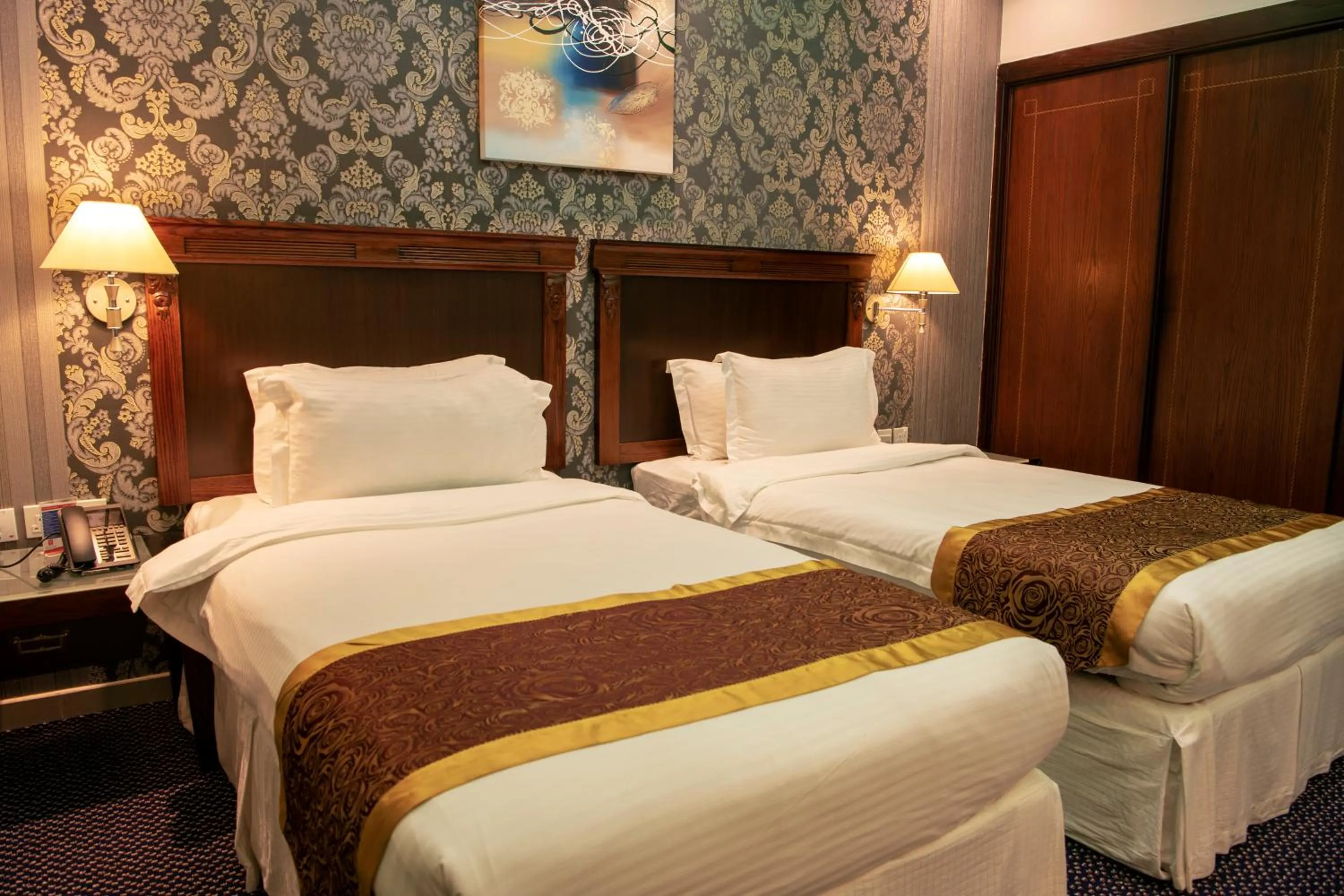 Bed in Jazan Inn Hotel