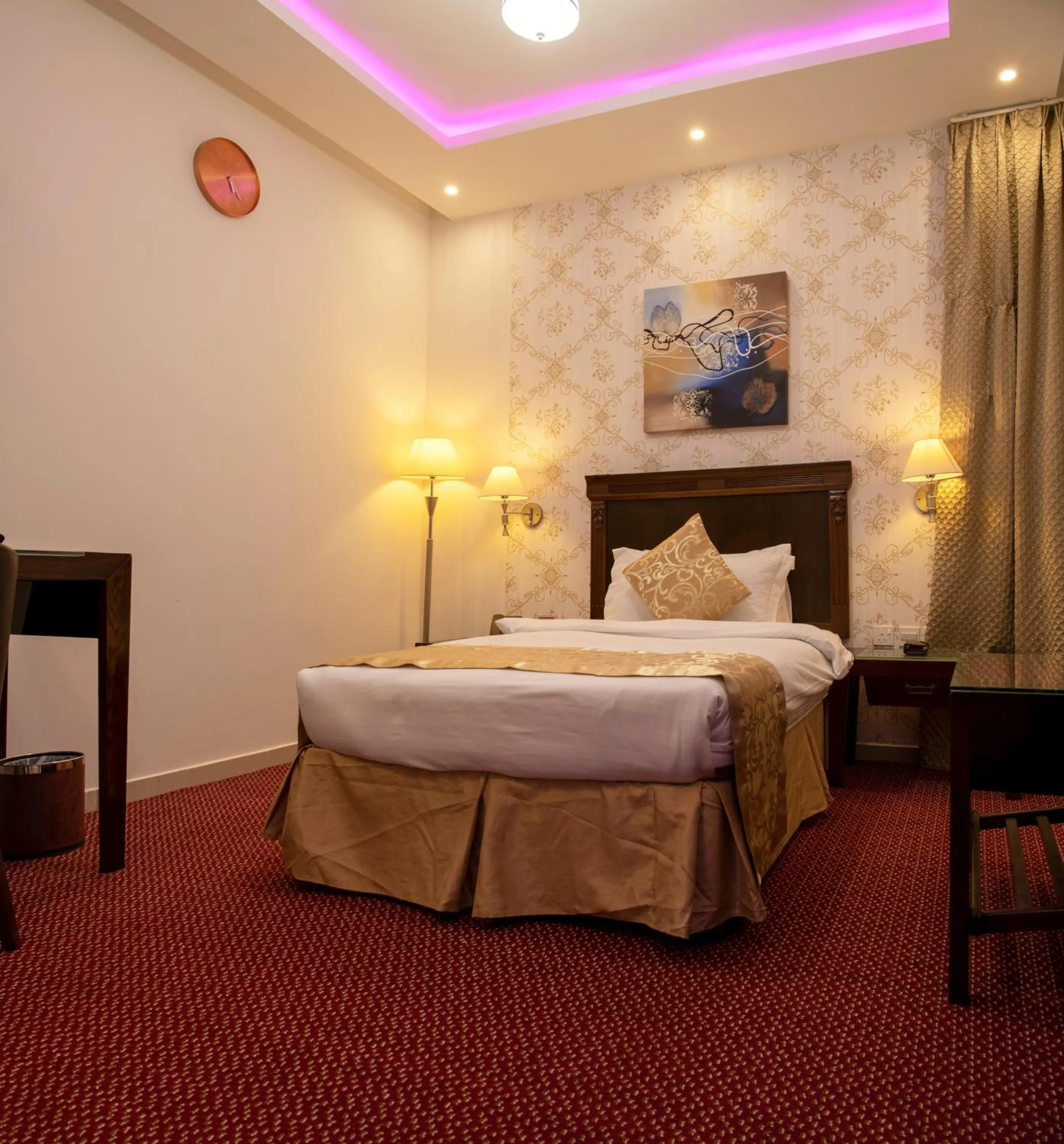 Bed in Jazan Inn Hotel