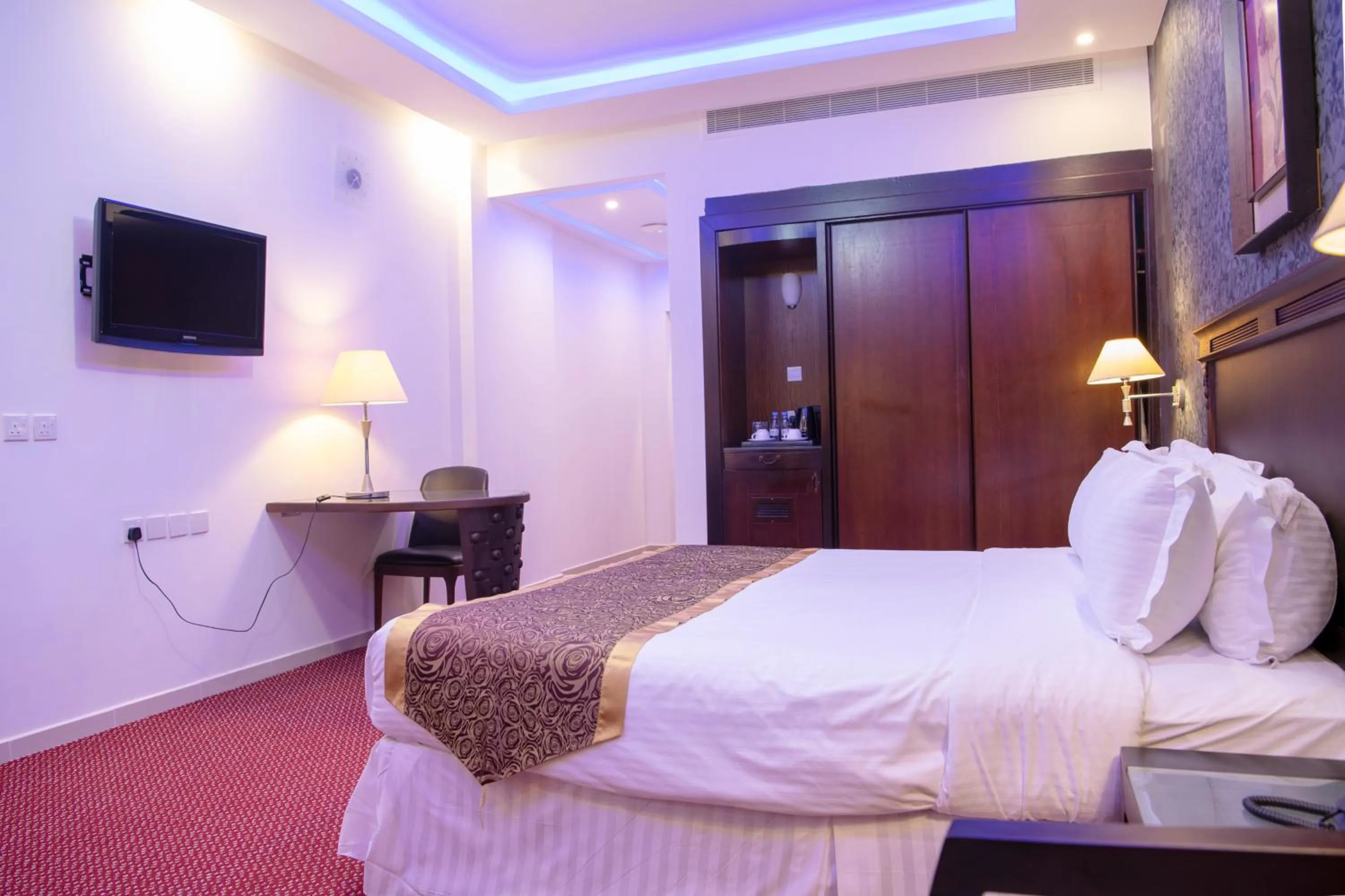 Bed in Jazan Inn Hotel