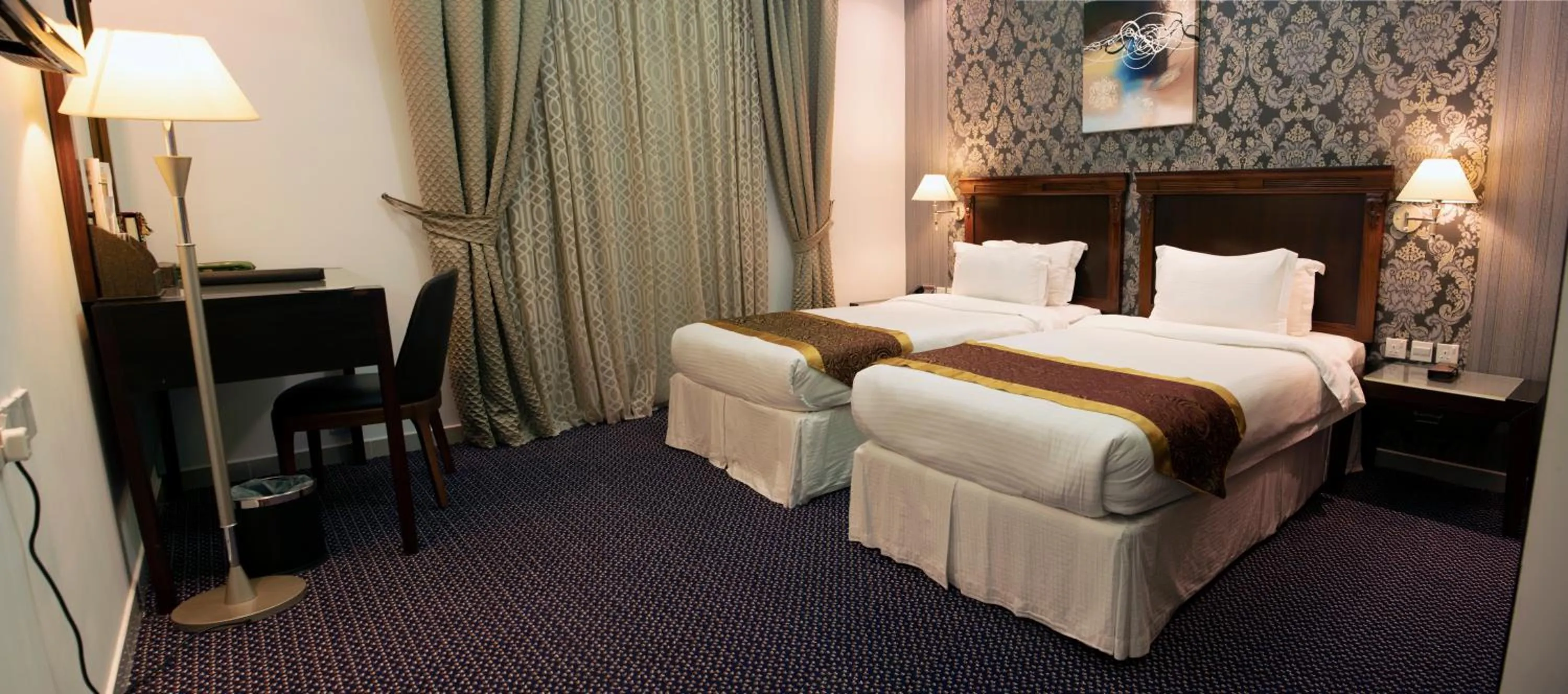 Bed in Jazan Inn Hotel