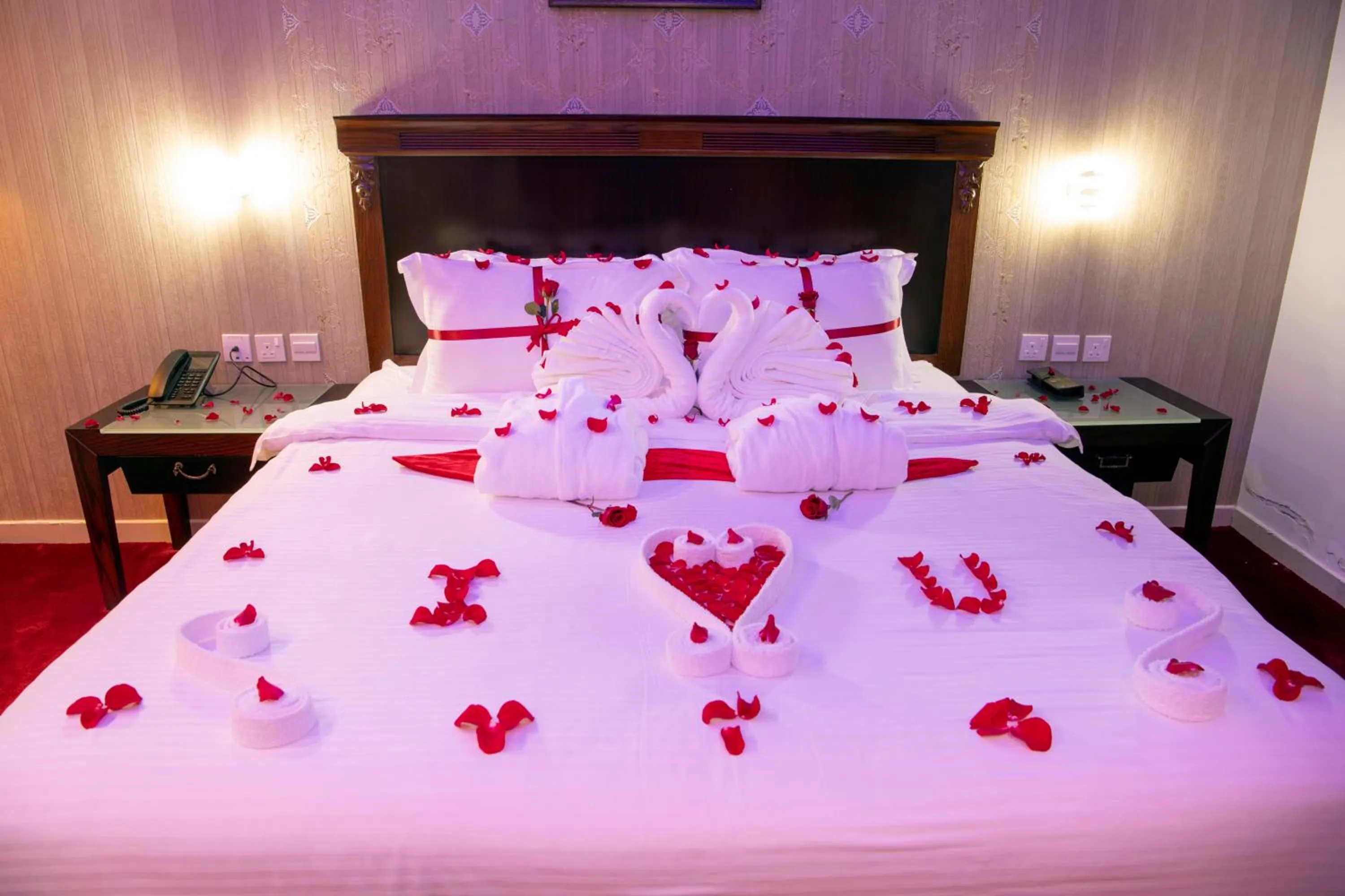 Bed in Jazan Inn Hotel