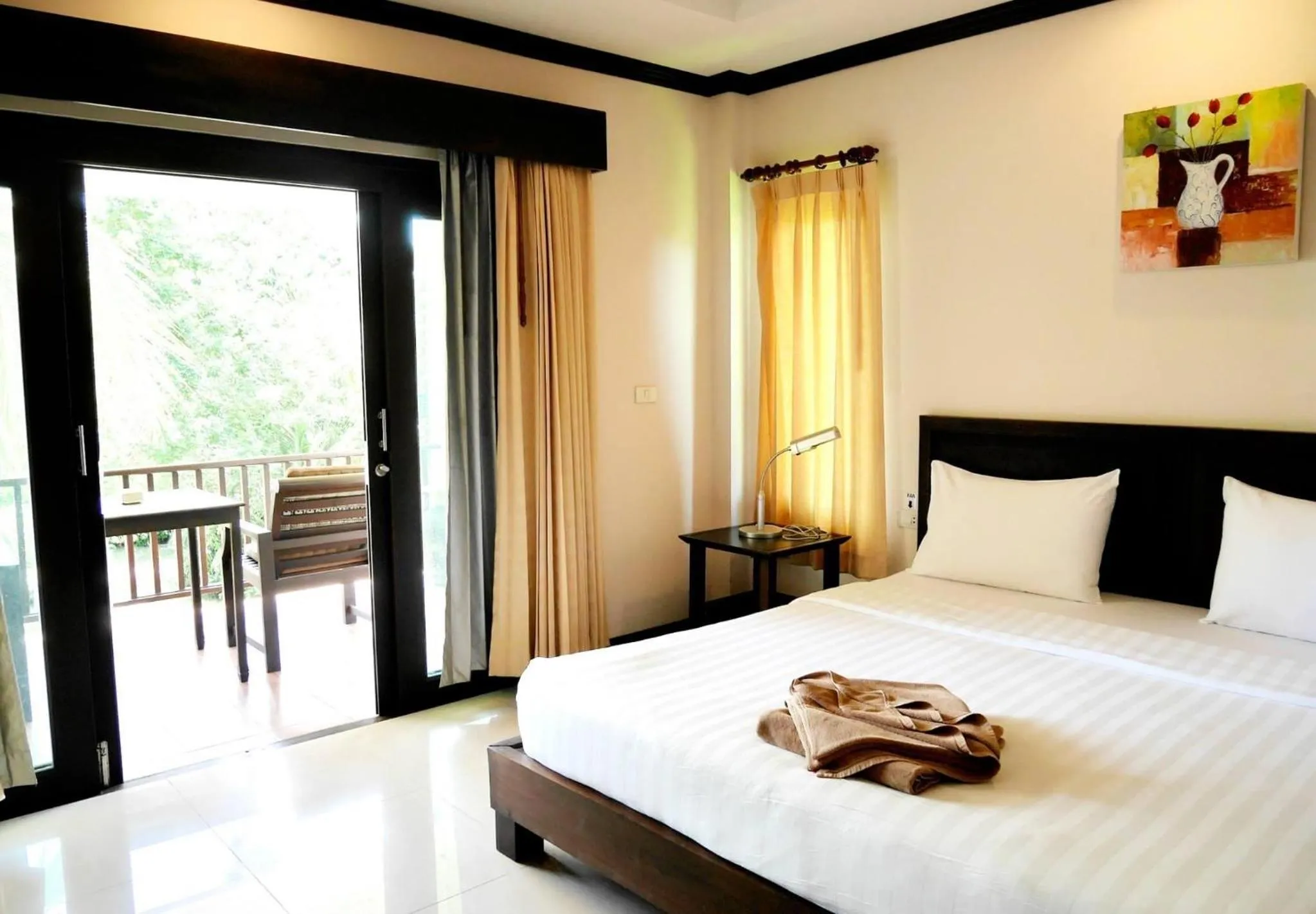 Bed in Grand Manita Beach Resort