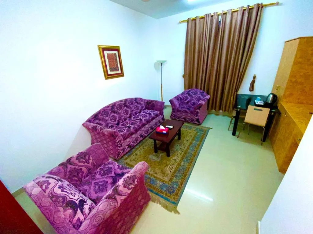 Living room in Savoy Inn Hotel Apartments