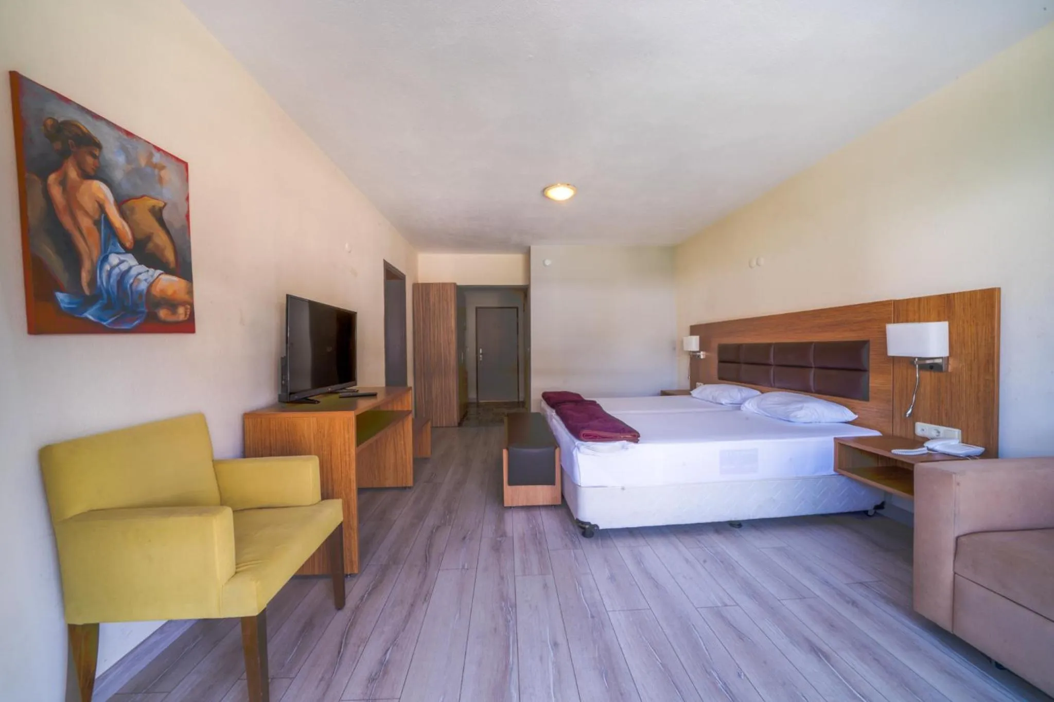 TV and multimedia, Bed in Begonville Hotel