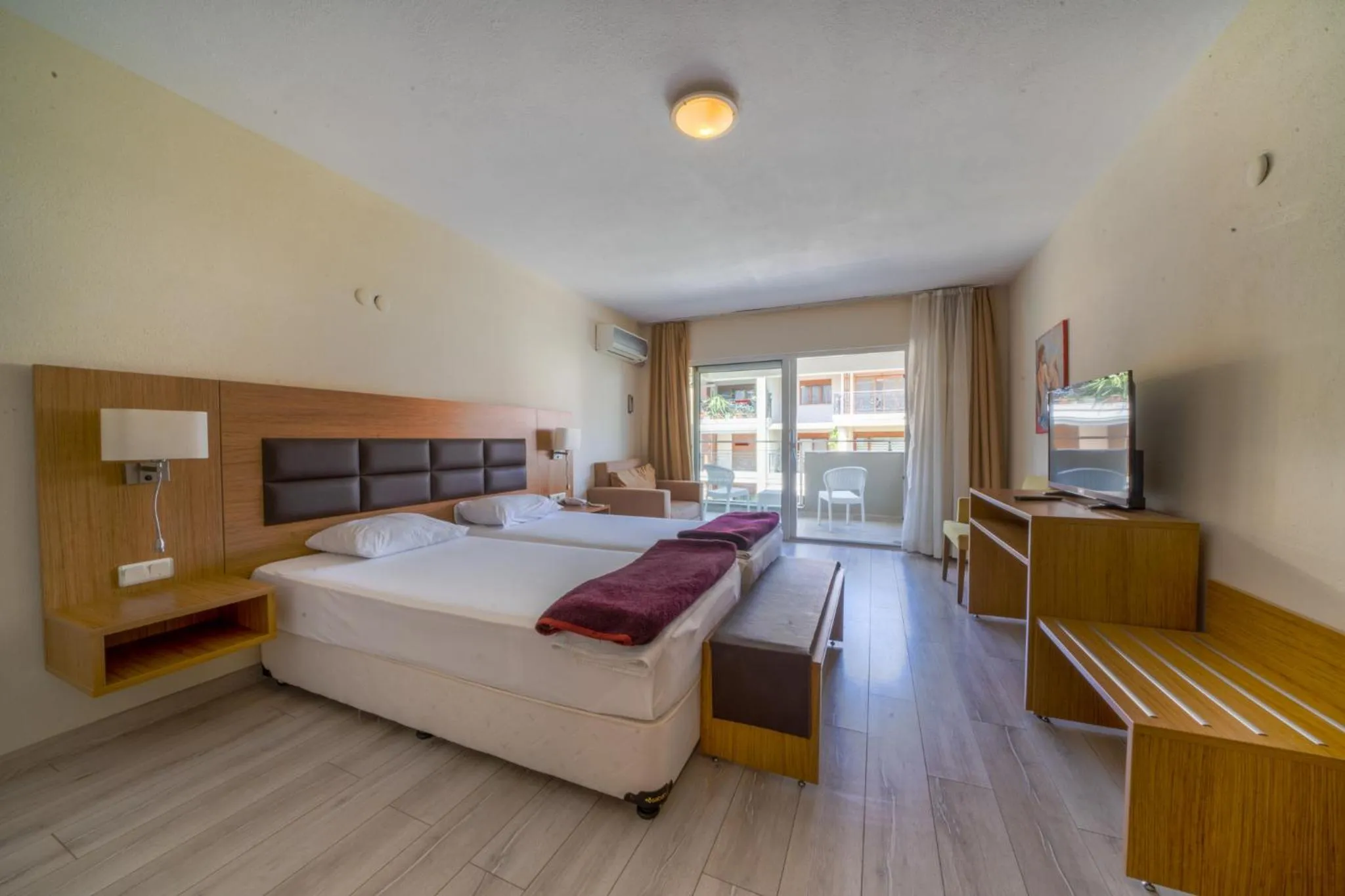 Bed in Begonville Hotel