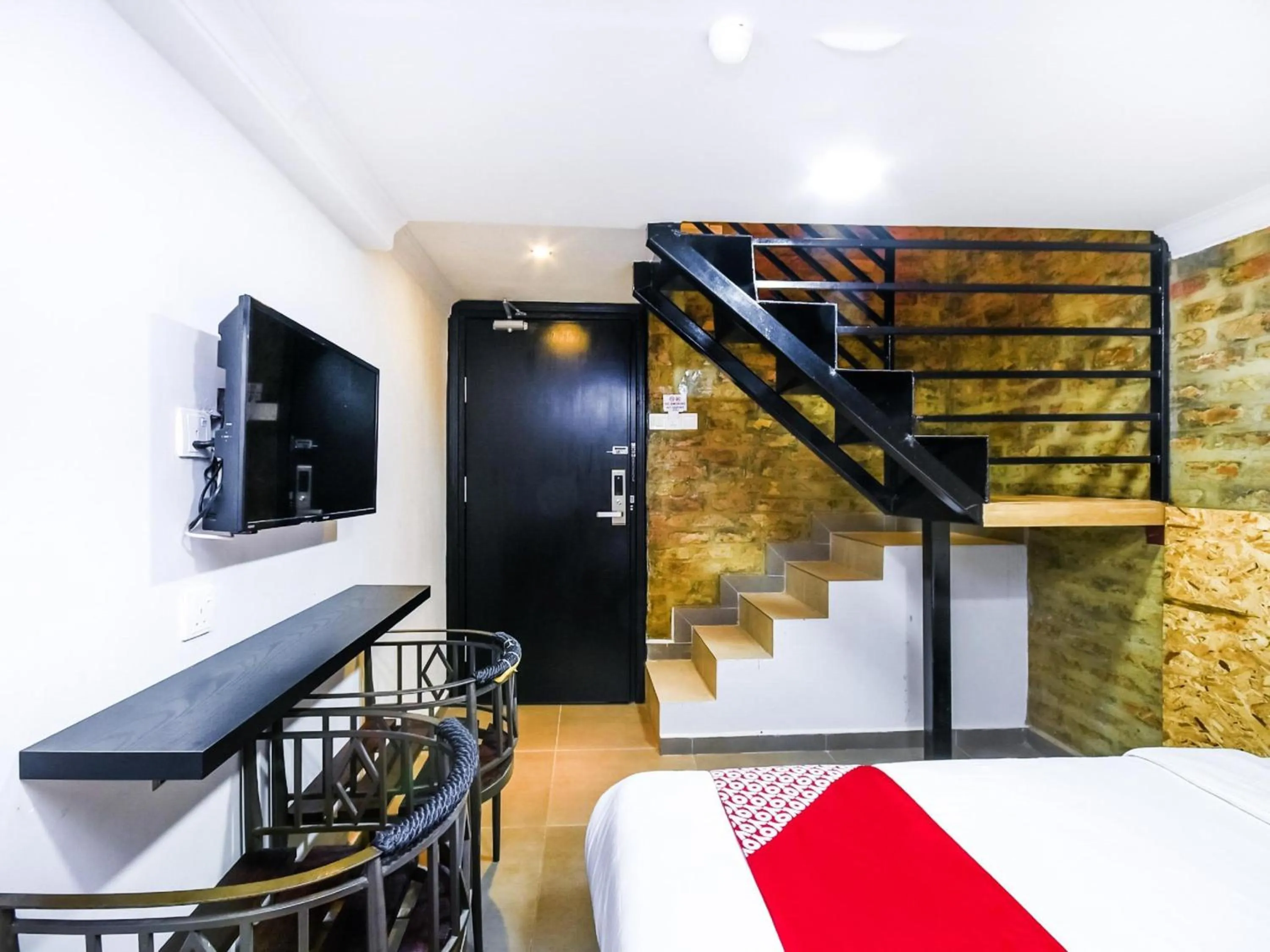 Photo of the whole room, Bed in Hotel O La Mirina Boutique Inn