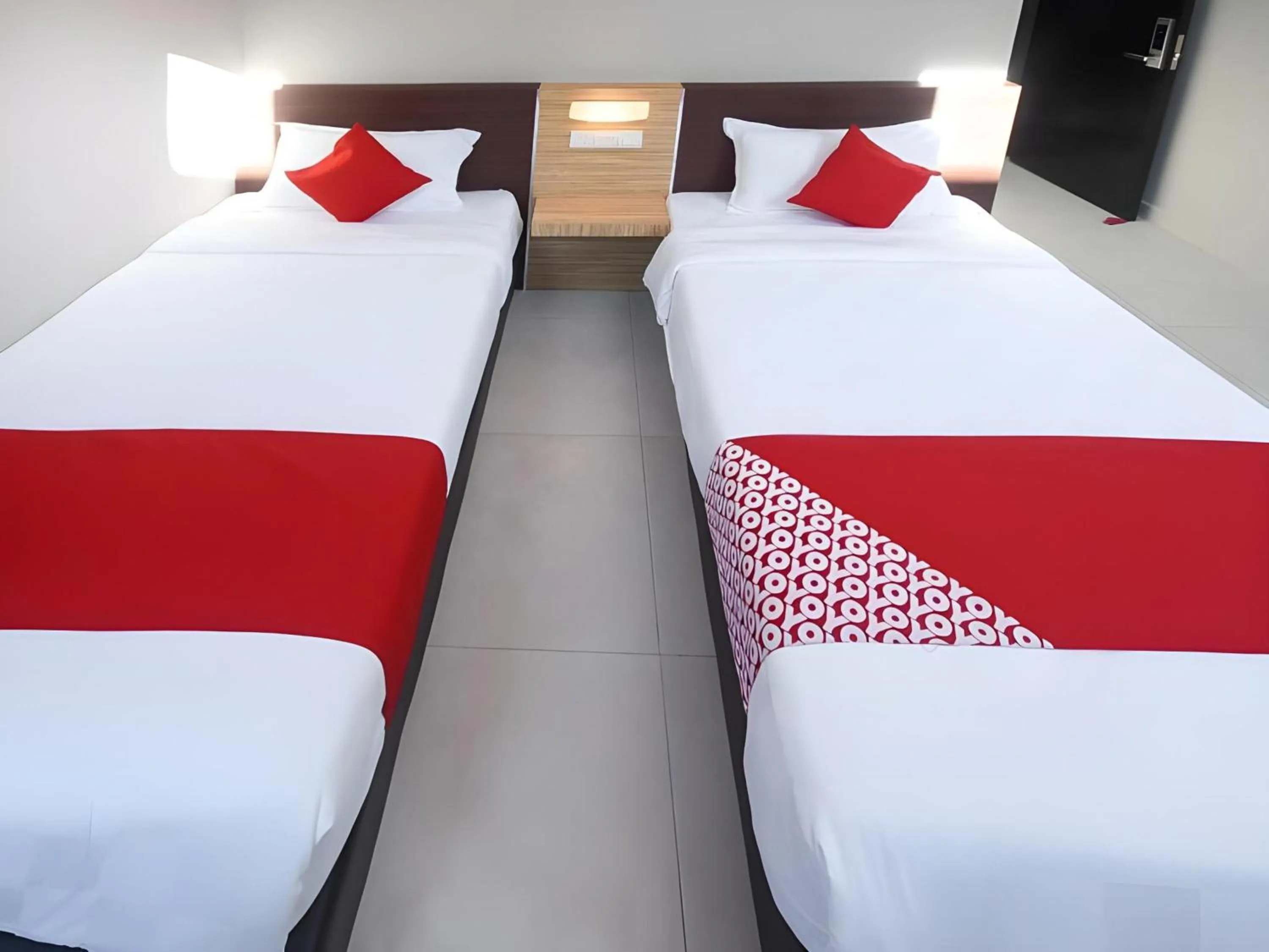 Photo of the whole room, Bed in Hotel O La Mirina Boutique Inn