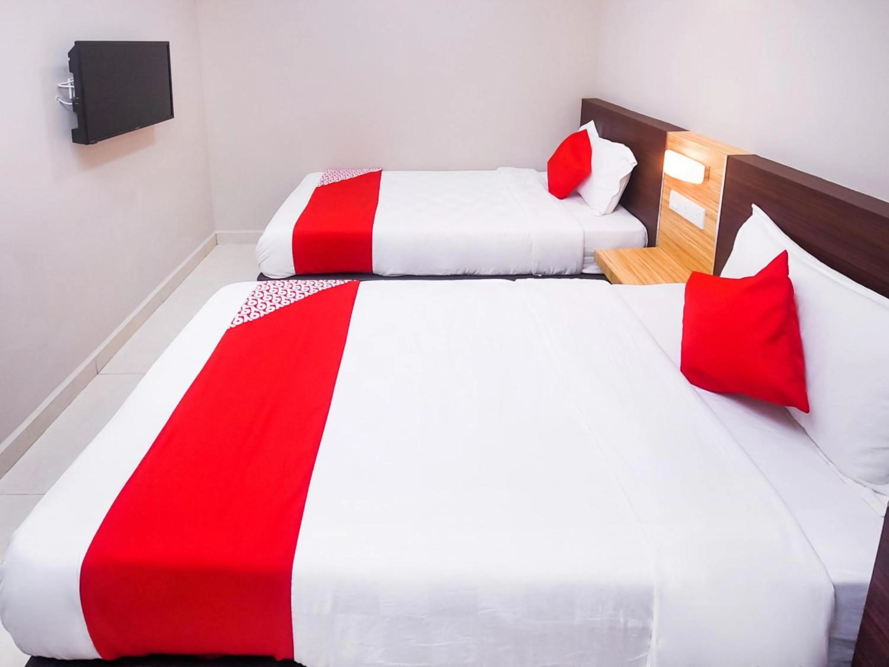 Photo of the whole room, Bed in Hotel O La Mirina Boutique Inn