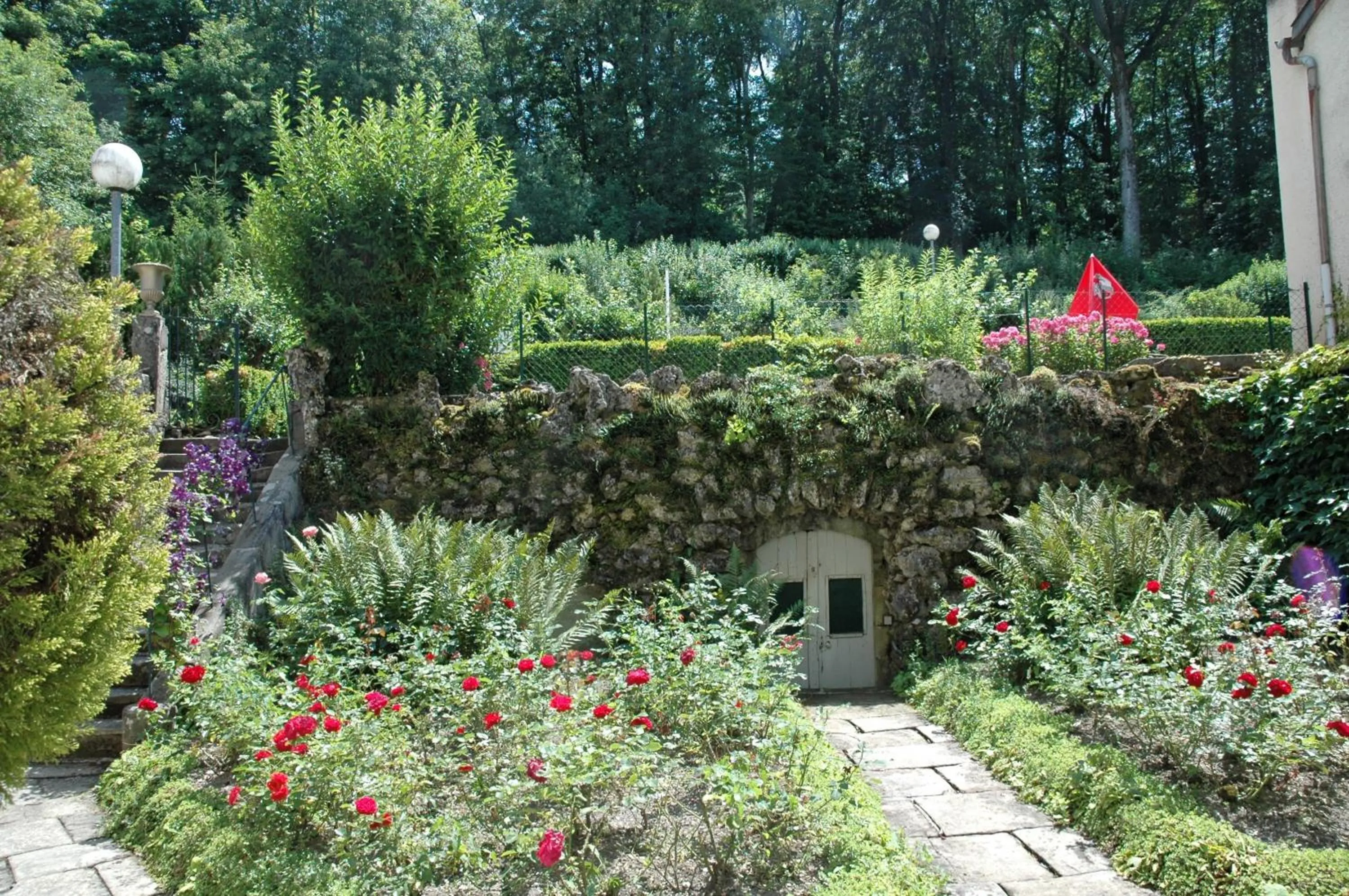Garden in Hôtel et Studios d'Orfeuil