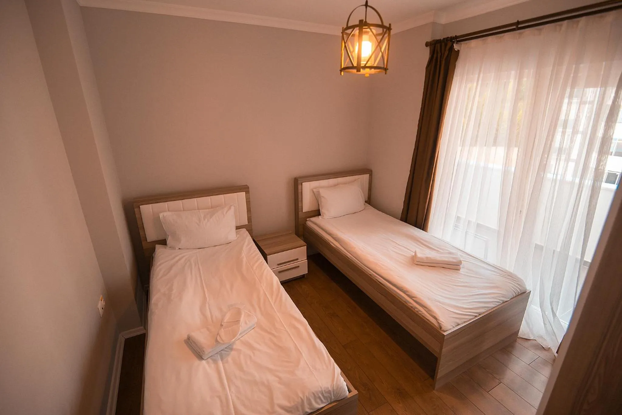 Bed in Royal Comfort Hotel