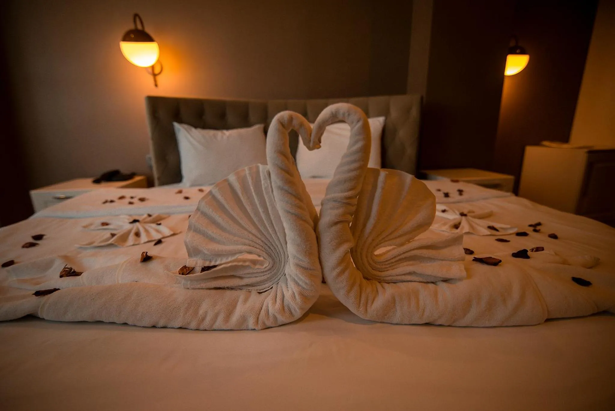 Bed in Royal Comfort Hotel