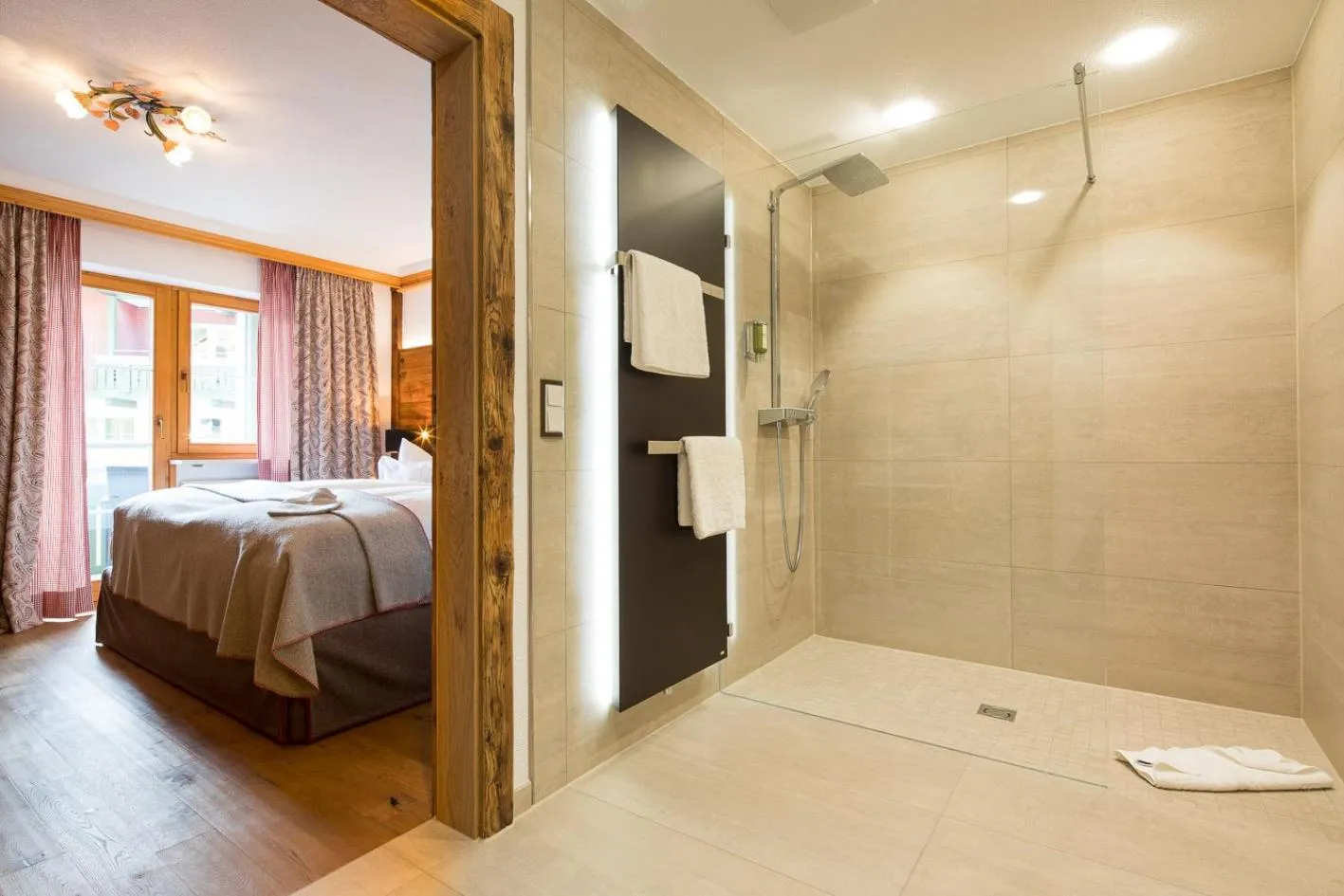 Photo of the whole room, Bed in Haller's Geniesserhotel