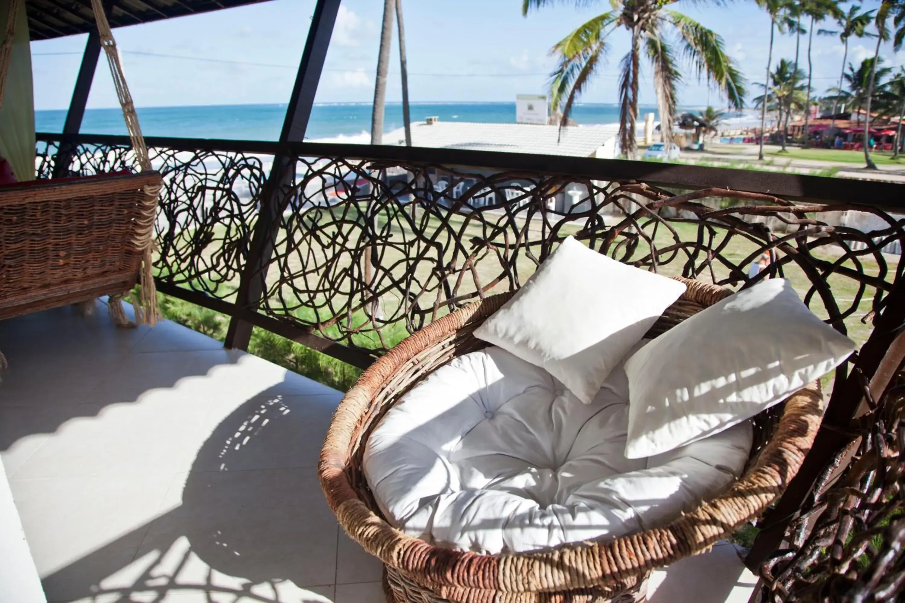 Deluxe Double Room with Balcony and Side Sea View in Pousada Maracabana Spa Deluxe Double Room with Balcony and Side Sea View in Pousada Maracabana Spa