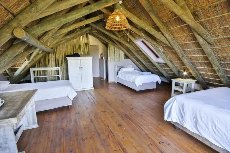 Bed in Oyster Bay Beach Lodge