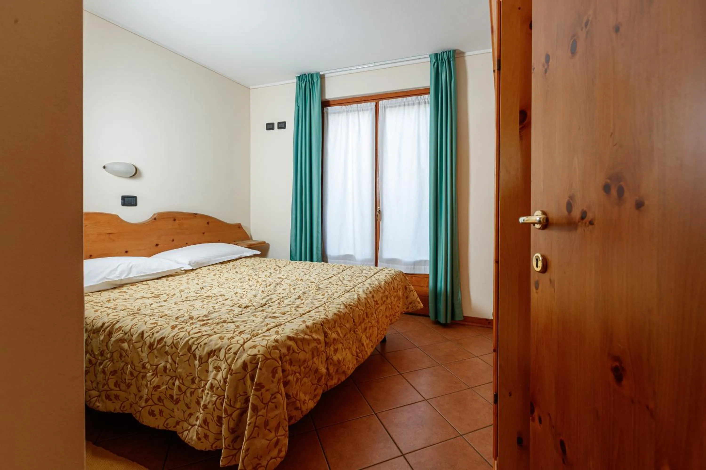 Bed in Hotel Villa Rina