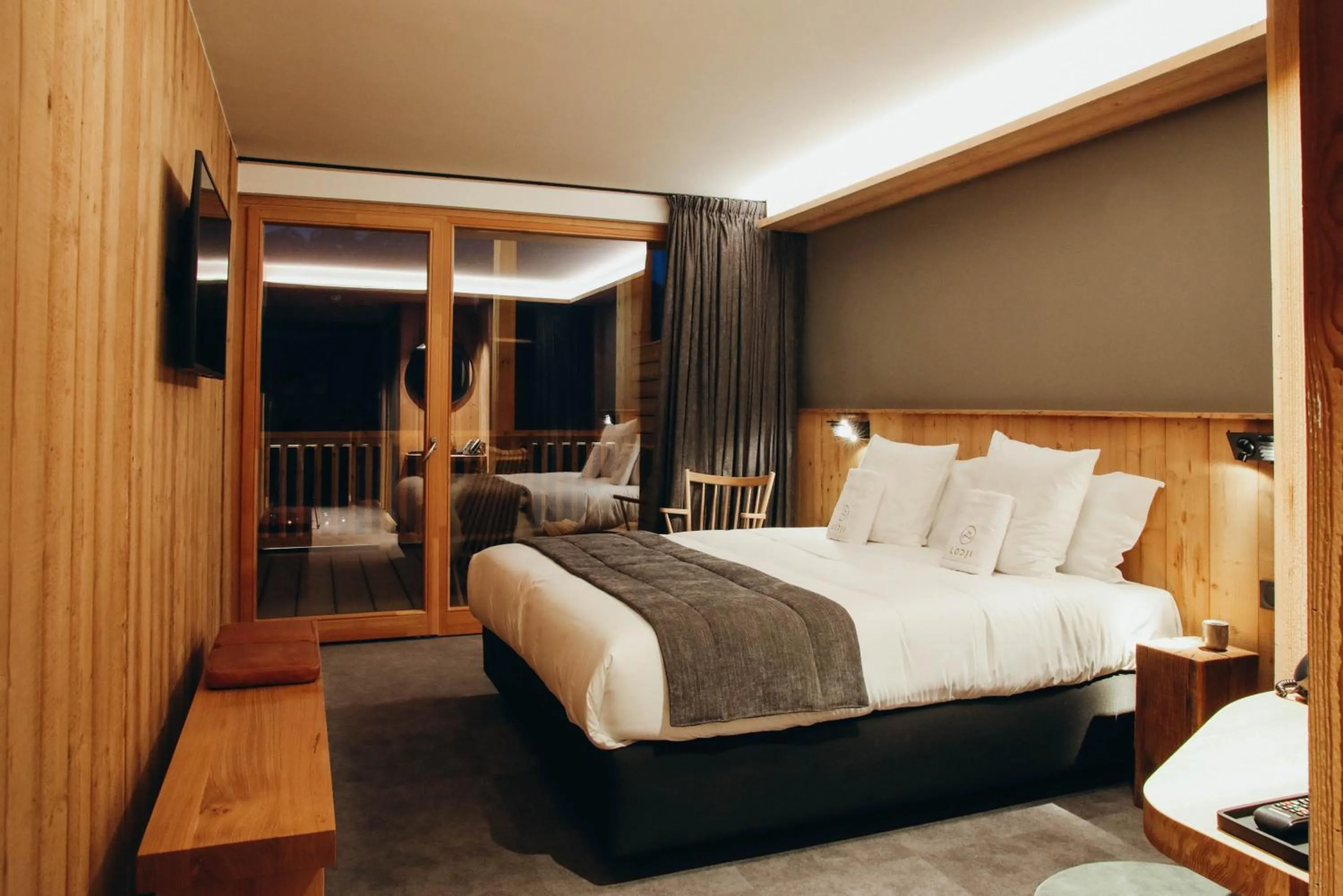 Bed in Lodji Hotel & spa