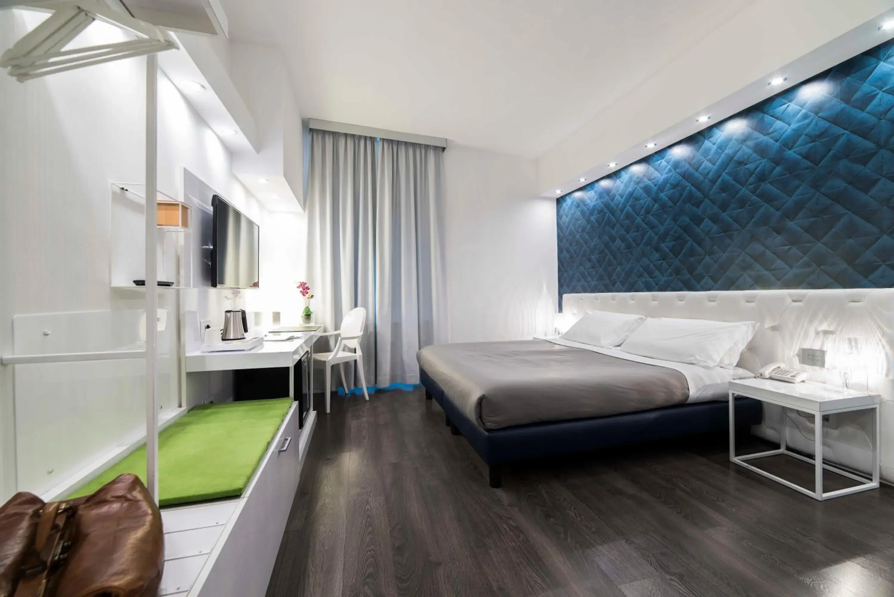 Deluxe Quadruple Room in Hotel Montestella Deluxe Quadruple Room in Hotel Montestella