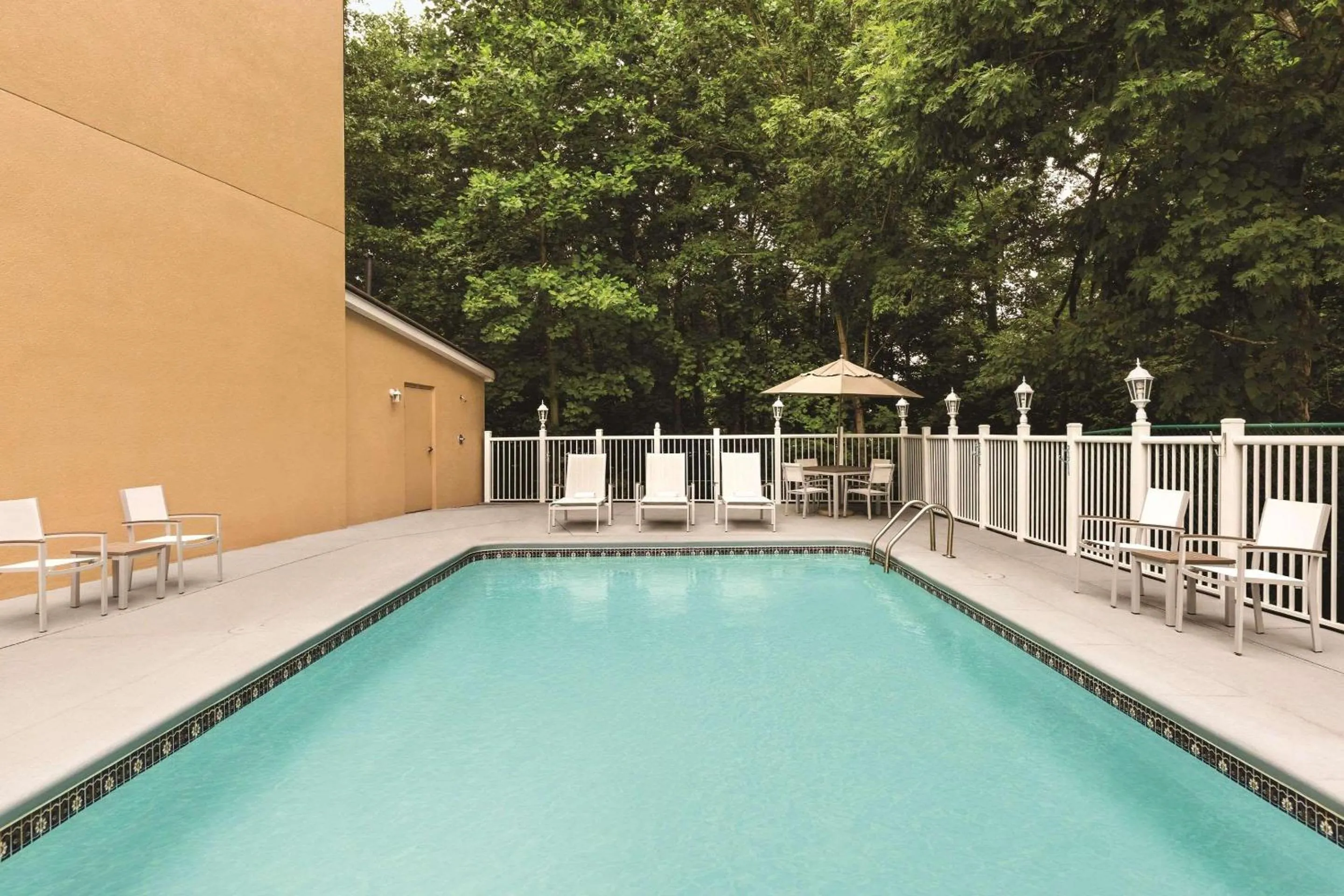 Swimming pool in Country Inn & Suites by Radisson, Lawrenceville, GA