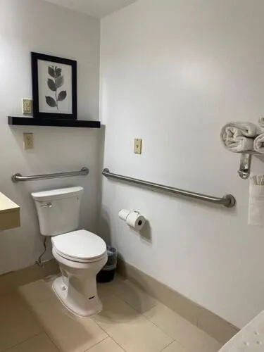 Bathroom in Country Inn & Suites by Radisson, Lawrenceville, GA