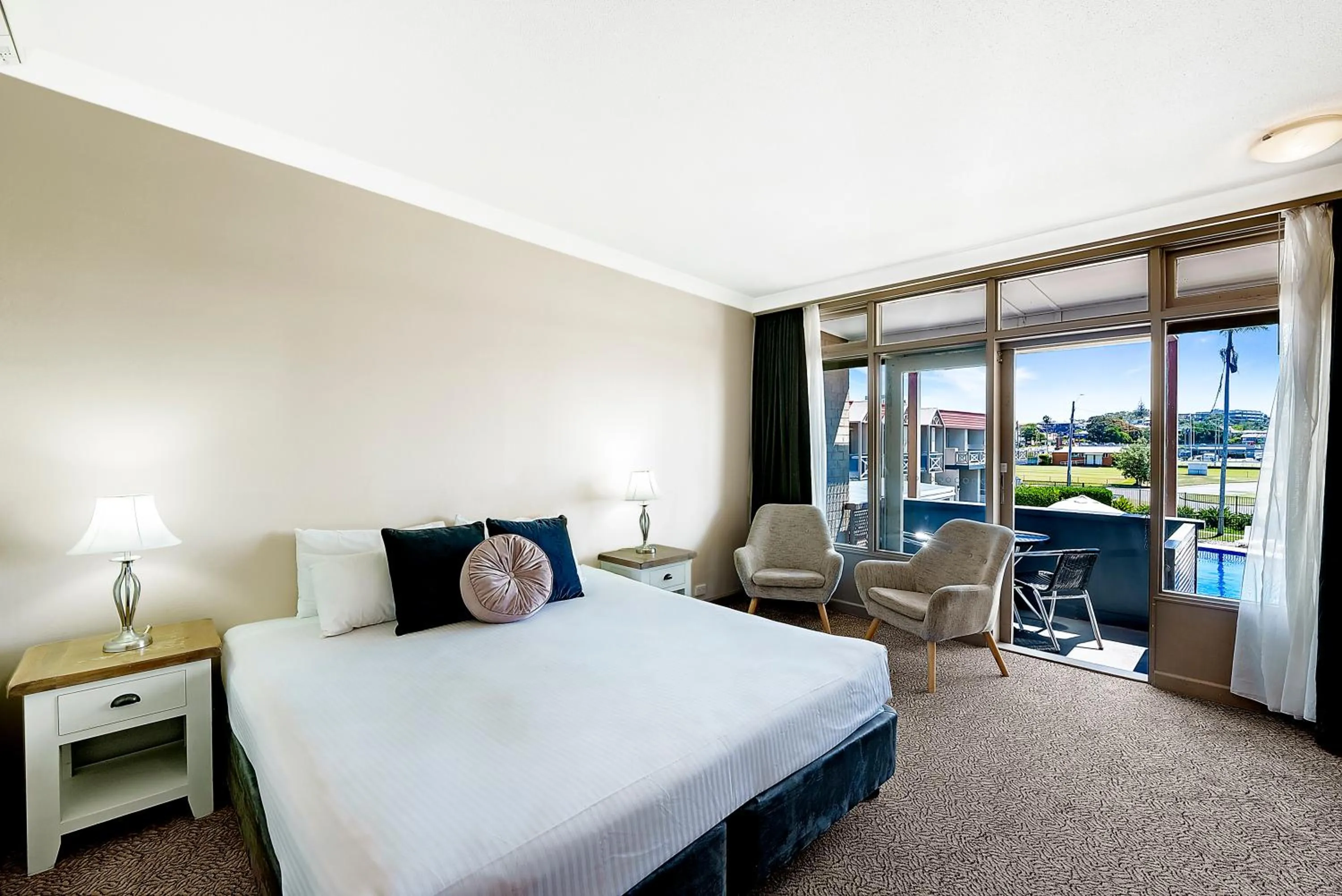 Pool view, Bed in Comfort Resort Waters Edge