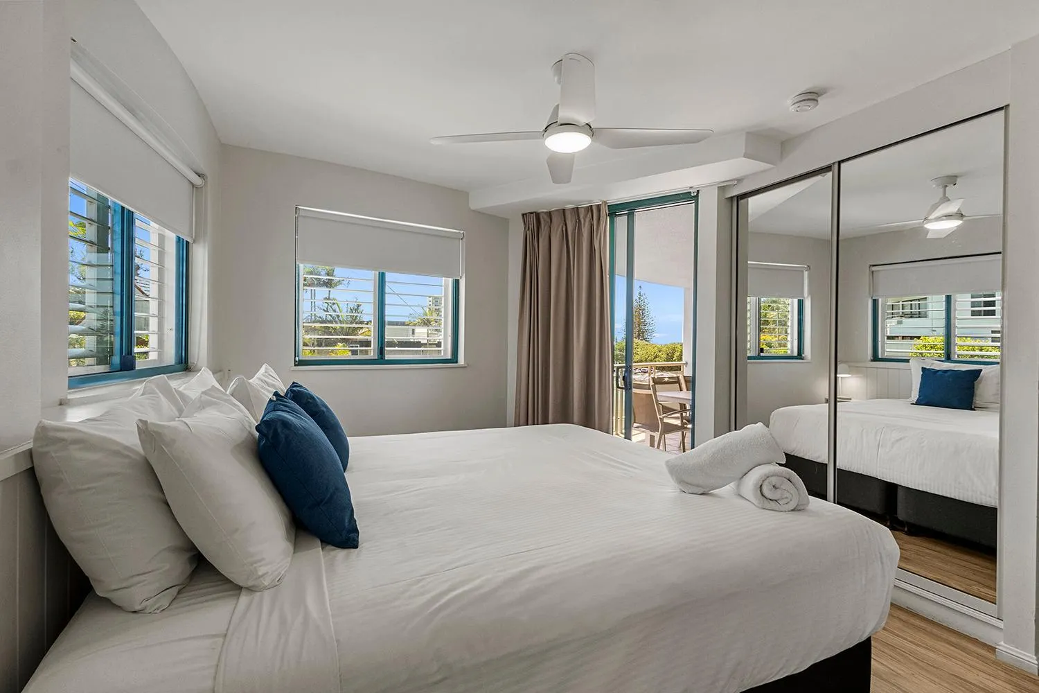 Bed in Grand Palais Boolarong Beachside Apartments