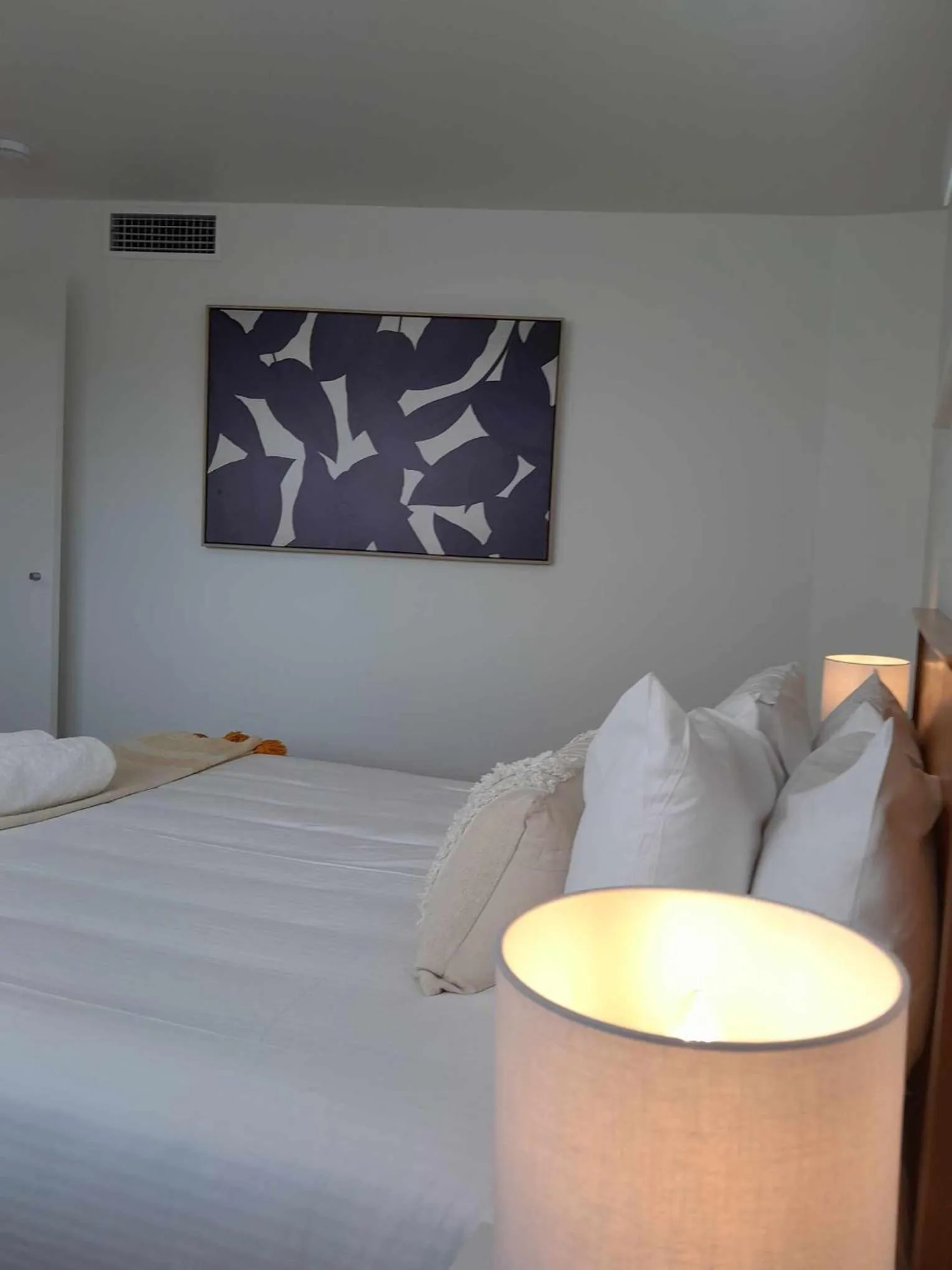 Bed in Grand Palais Boolarong Beachside Apartments